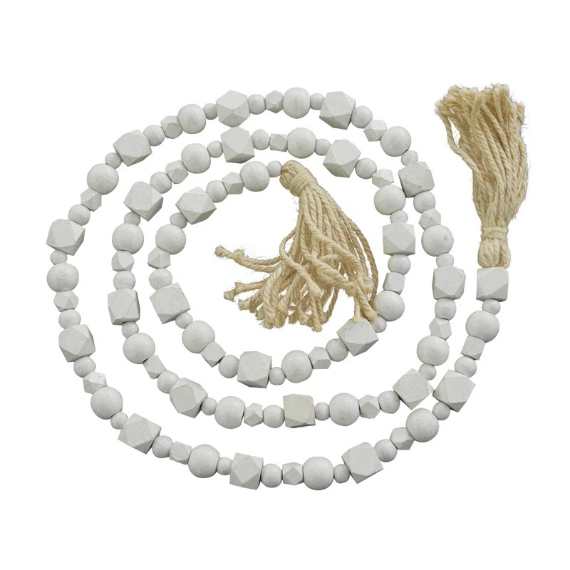 Mango Wood Handmade Hexagon Carved Geometric Long Beaded Garland with Tassel | Wayfair North America