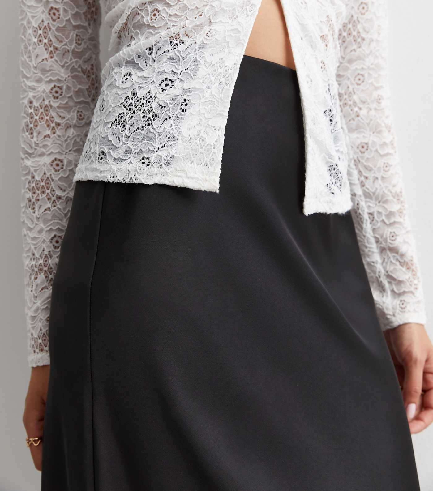 Black Satin Bias Cut Midaxi Skirt
						
						Add to Saved Items
						Remove from Saved Items | New Look (UK)