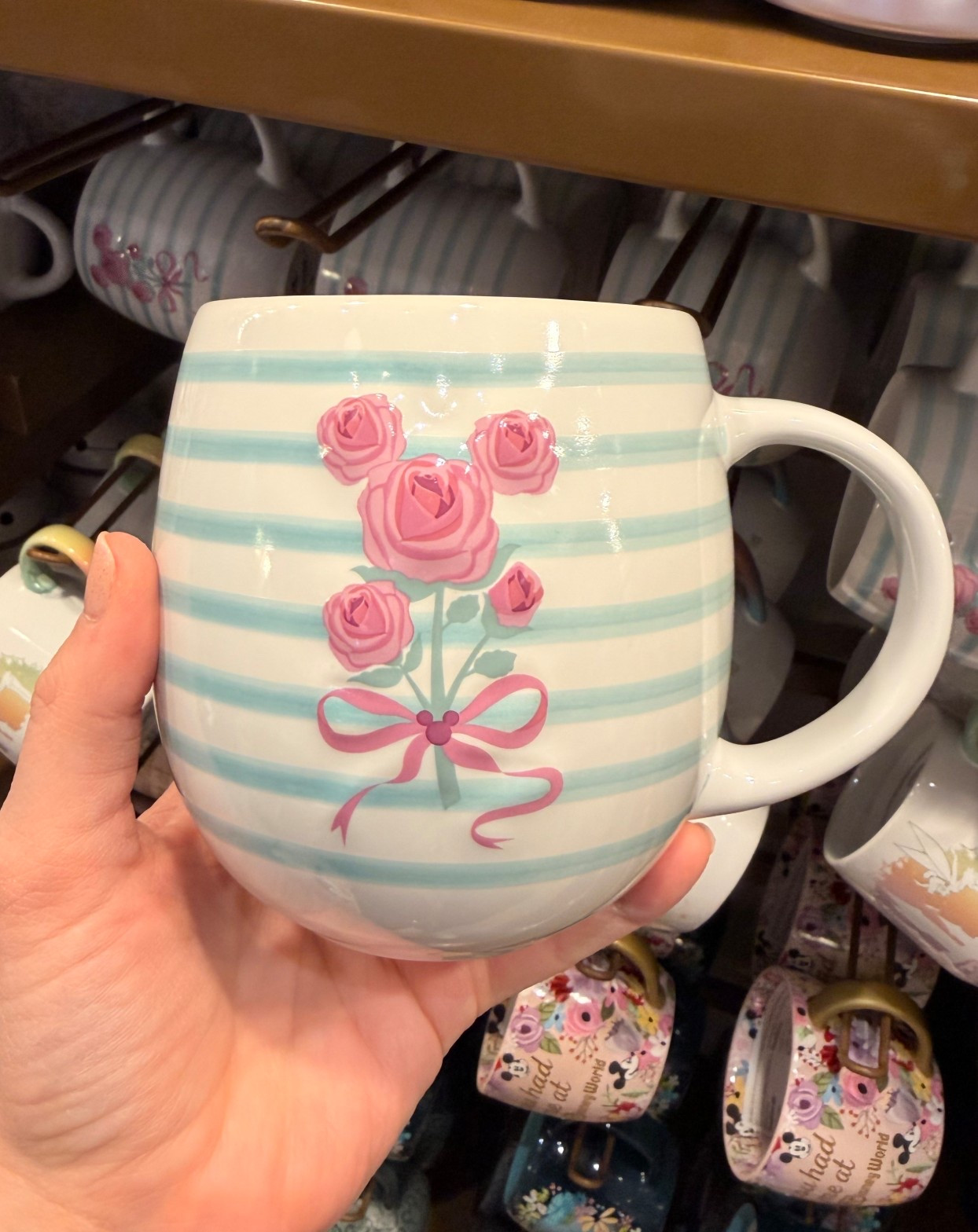 Disney striped mug with rose and bow

#LTKValentine #LTKfoodie #LTKHome