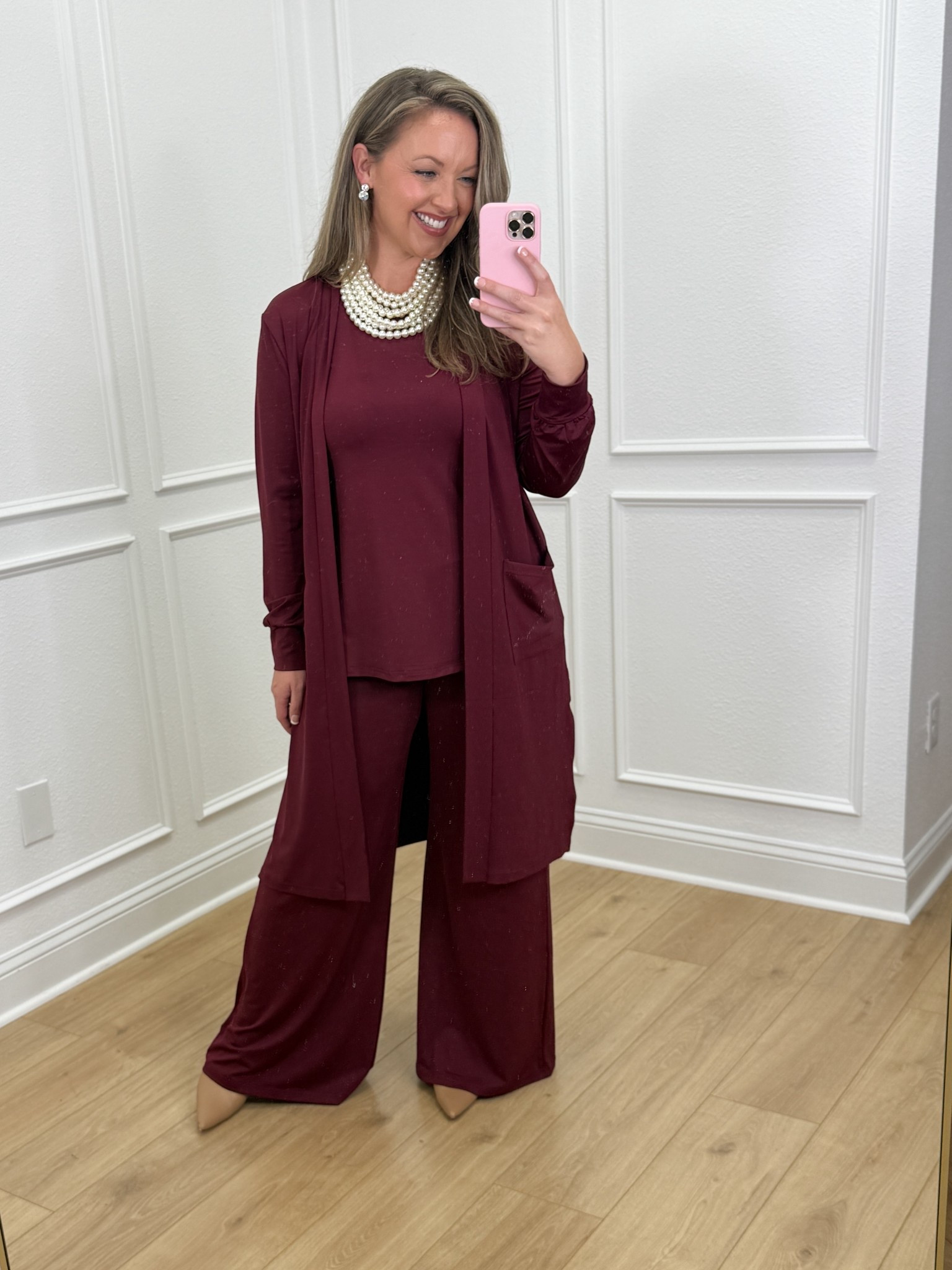 How chic is this three piece set from The Willow Tree ! Love that you can dress it up or down ! And this burgundy color is stunning 😍 I am 5’5” size 8/10 wearing size Medium (I have heels on!) comes with wide leg pants , high neck tank , and long open front cardigan all in this comfy active material that is perfect for travel, special events , or the holidays! 

#twt #shopwillowtree

#LTKHoliday #LTKFindsUnder100 #LTKSeasonal