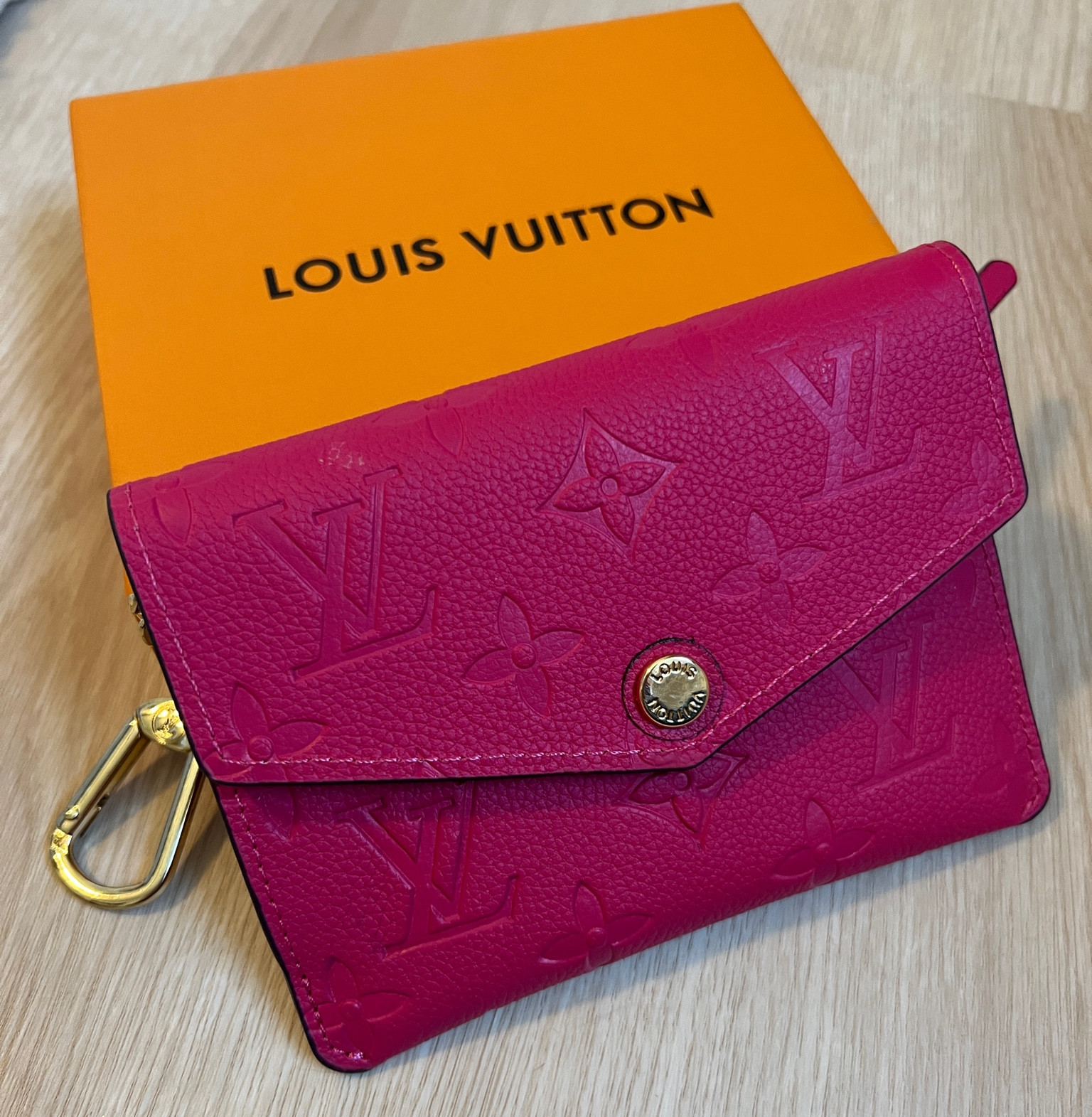 Mini wallet / keychain! No card slots. Just a zipper in the back and coin purse in the front.