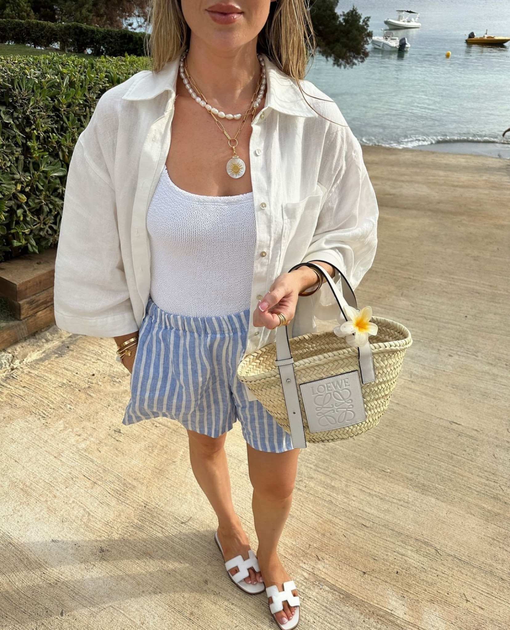 Nautical stripes for today’s beach look 🤍🩵 who doesn’t love a classic blue and white stripe and white linen combo, styled with my Hunza G white seersucker swimsuit

#LTKswimwear #LTKluxury #LTKsummer