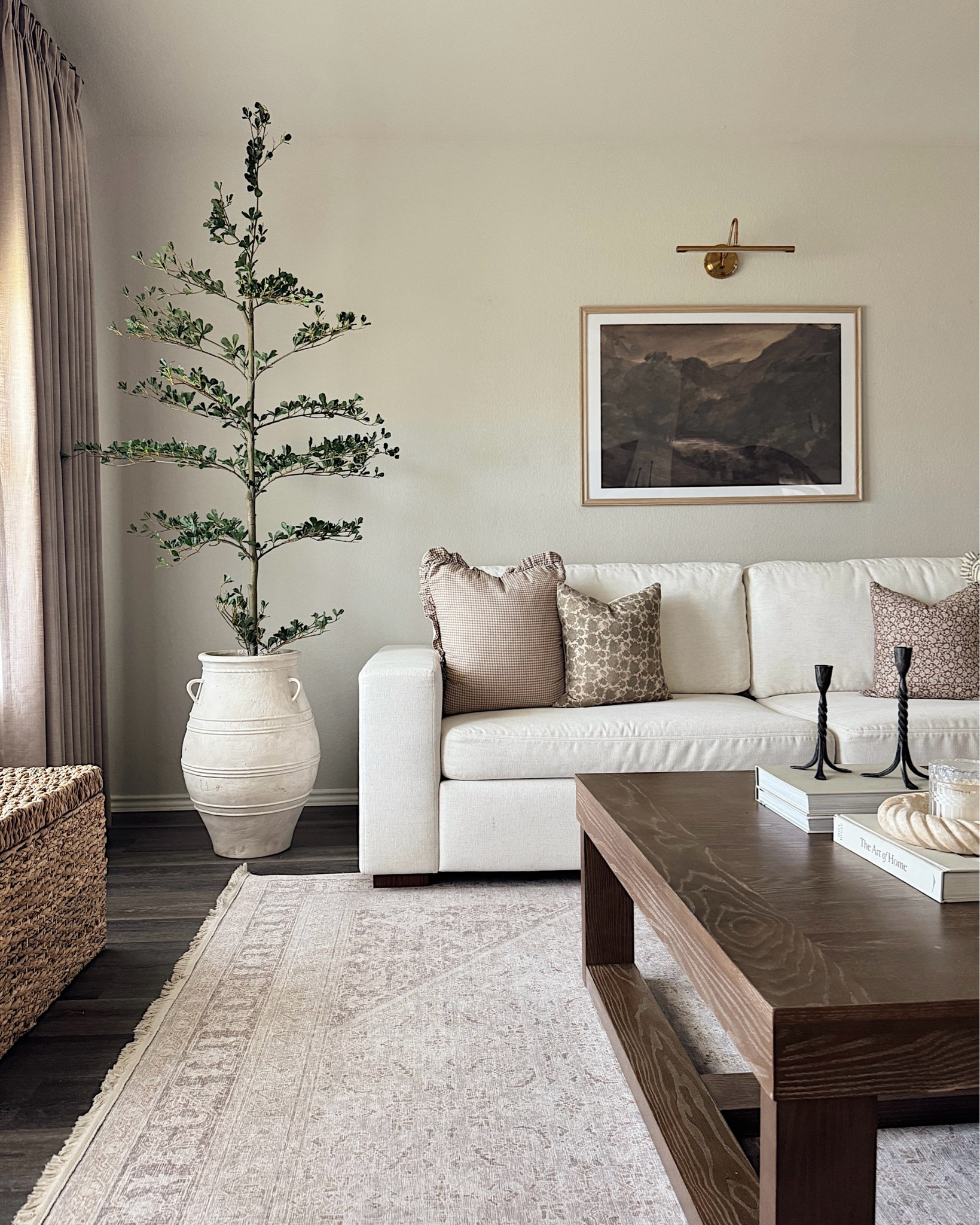 It’s the little details that make a house feel like home. 🤎 We chose the @albanyparkhome Barton Sofa in the performance basic weave fabric in the color sand, and I still can’t get over the soft texture, clean lines, and warm wood legs. It’s timeless, incredibly comfortable, and the performance fabric makes it easy to enjoy every day without worrying about spills or messes. comment “shop” and i’ll send you the link! 
#myalbanypark #albanyparkhome #livingroom #livingroominspo #cozyhome