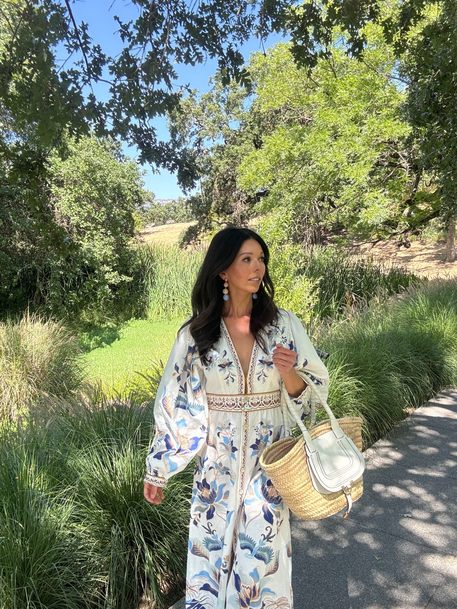 Summer hues of blue 🩵 
- SALE alert.. My dress is so beautifully made. I wore it to an event in Napa Valley and got so many compliments. It runs true to size. I’m wearing a size small here. The linen blend makes it perfect for warm weather. 50% off right now! 
- These statement earrings are PERFECT with the blues in this dress. I love how lightweight they are.
- Chloe basket tote bag. 

Blue and white summer dress 
Farm Rio dress
Summer wedding guest dress 
Napa Valley wine tasting outfit 

#LTKSaleAlert #LTKTravel #LTKWedding