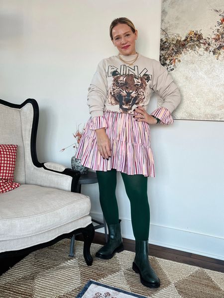 The kids are back at school and I’m feeling fierce 🐅 outfit of the day - tuckernuck summer dress styled for winter, green colored tights, anine bing sweatshirt, t-bar Boden necklace, madewell earrings, chelsea boots 
Love, Claire Lately 

#LTKshoecrush #LTKworkwear #LTKstyletip