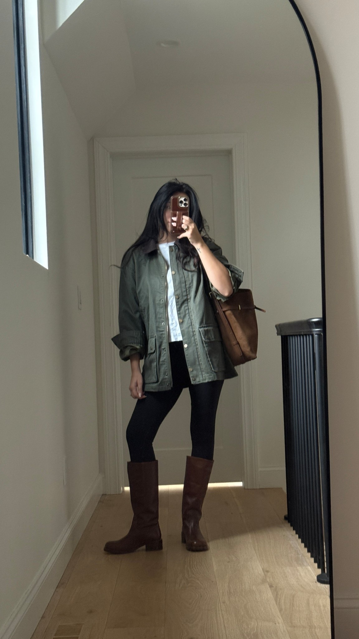 Wearing a medium jacket & a small in the tee & leggings. Boots I went up half a size