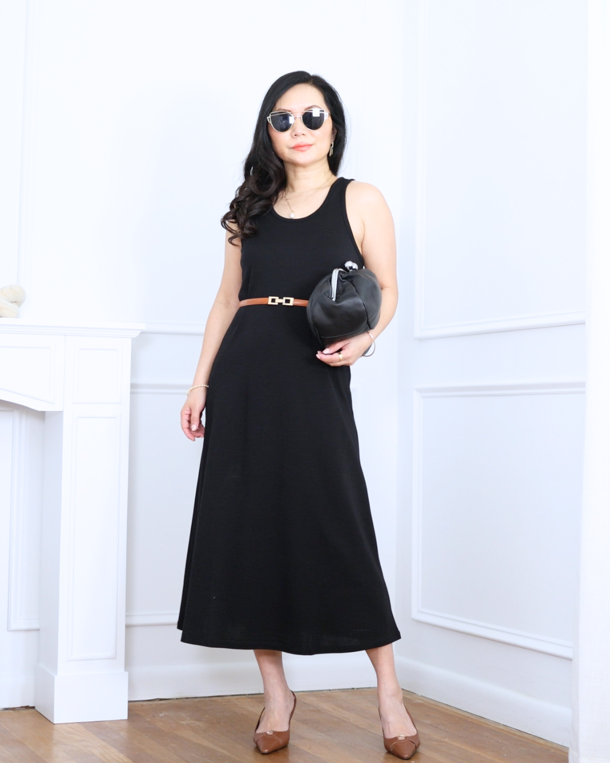 Long black dress from Unbound Merino paired with a black clutch and heels from Mango — sleek, timeless, and effortlessly elegant for any evening out. I'm 5'2, wearing size S. 

 #LTKootd #LTKOver40 #LTKPetite