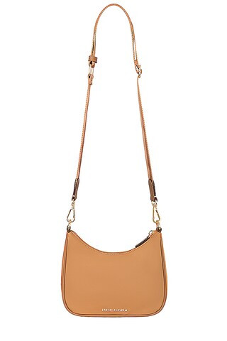 Stoney Clover Lane Curved Crossbody in Honey from Revolve.com | Revolve Clothing (Global)