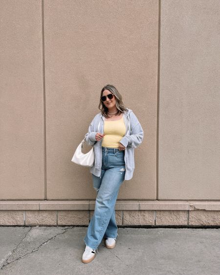 Casual midsize spring outfit - yellow tank top, baggy jeans, grey hoodie, sambas, Amazon bag


#LTKmidsize #LTKSeasonal #LTKfindsunder100