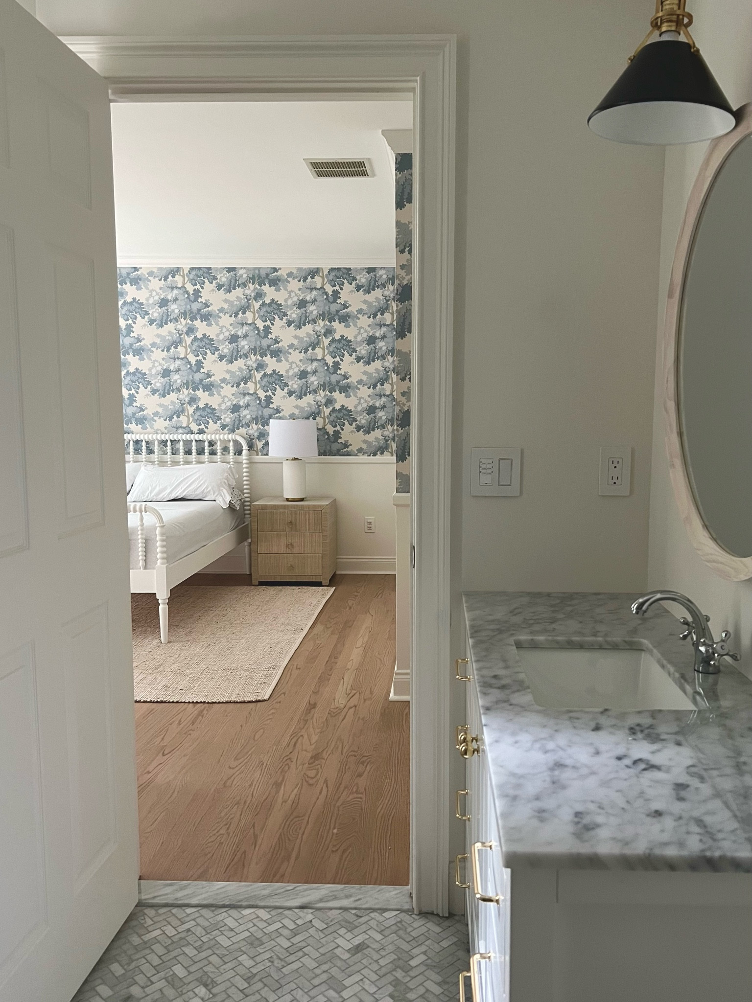 Kids room, bedroom, coastal, classic, modern, blue wallpaper, Jenny Lind bed, jute rug, marble, bathroom, white bathroom, kids bedroom, grasscloth nighstands, white lamp, blue, neutral, off white 

#LTKhome #LTKbaby #LTKkids