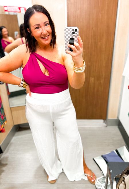 This swimwear look is a definitely no for me but I still wanted to link it!  XL in the swimsuit. L in the pants. Neither is flattering on my curves!  But you can decide if you want to try these!  

#LTKxTarget #LTKfindsunder50 #LTKmidsize