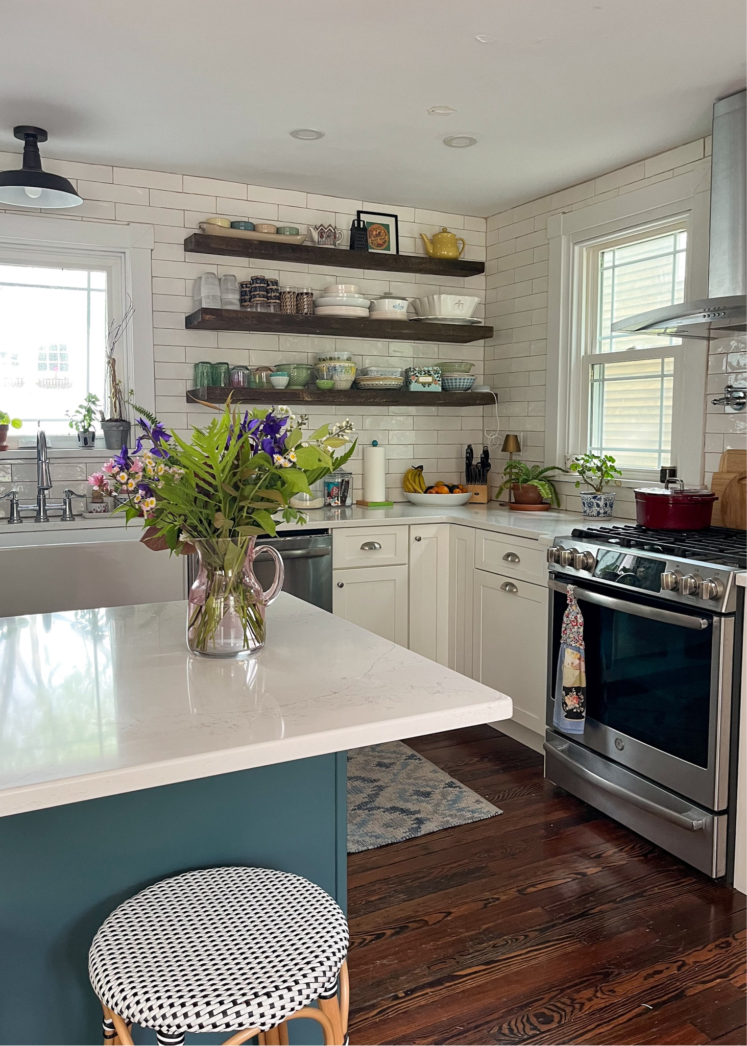 A clean kitchen makes for a happy mama 🩷 Thinking about adding some layers with print & color in here & changing the light fixture to something glass & gold or brass! 

#LTKHome