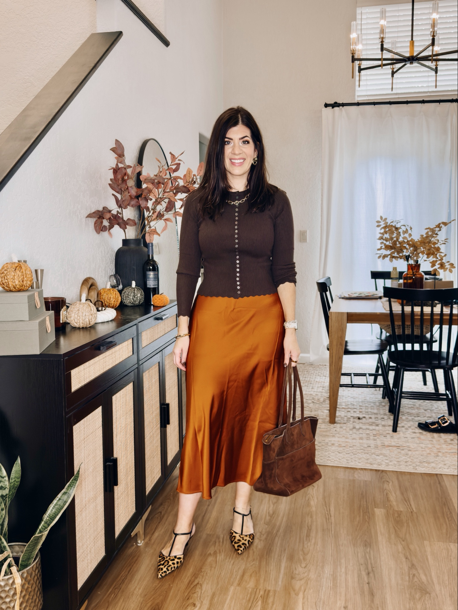 In a medium sweater and large slip skirt 

#LTKTall #LTKWorkwear #LTKMidsize