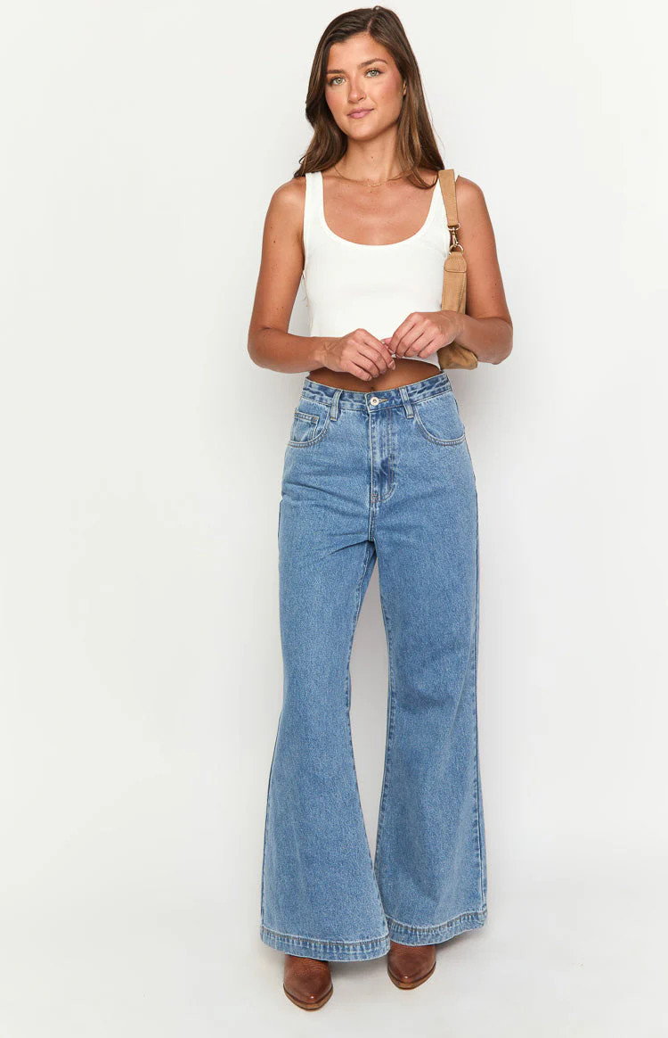 Dandy Mid Wash Denim Star Pocket Flare Jeans | Beginning Boutique | Beginning Boutique (US)