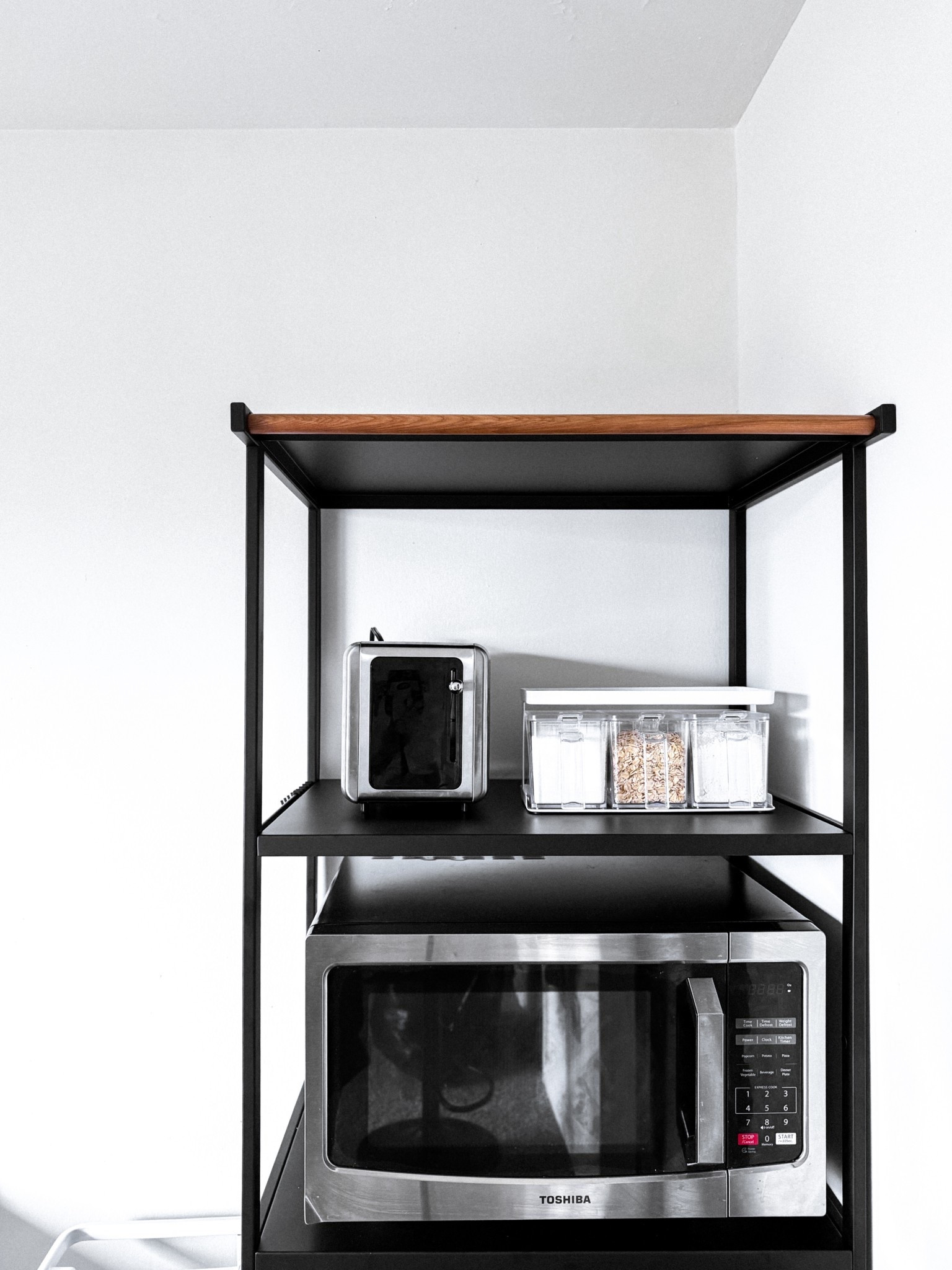 finally got a stand for our microwave and i couldn’t love it more! our beverage fridge fits perfectly underneath and it even has hooks on the side to hang things 🖤
#yamazaki #smallspacesolutions #microwavecart #kitchen #kitchenorganization #spiceorganizer #smarthome 

#LTKHome #LTKSaleAlert #LTKFindsUnder50