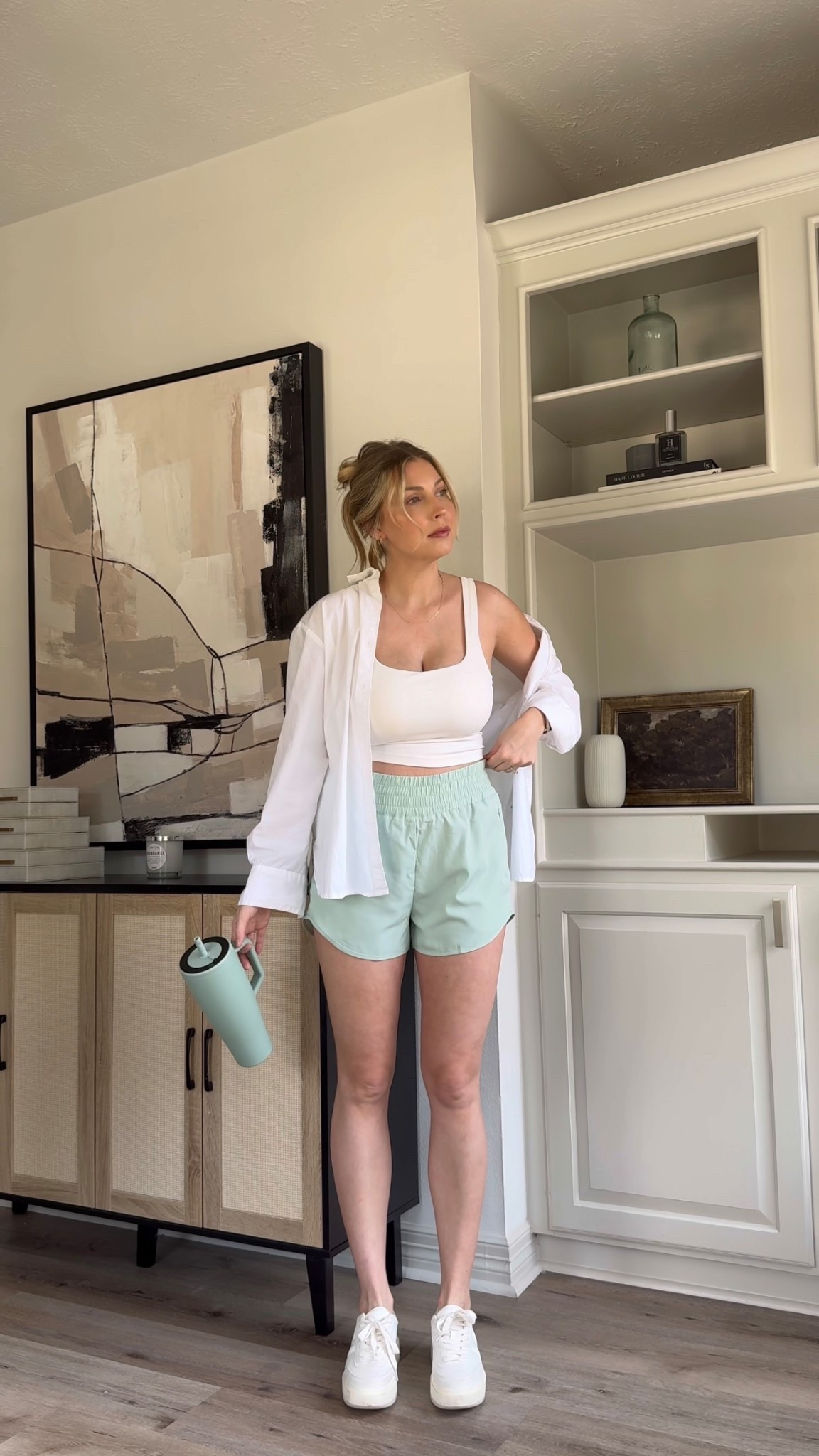 Casual spring athleisure outfit | wearing a size M in running shorts, sports bra tank, and button up. Sneakers are tts.

#LTKShoeCrush #LTKActive #LTKStyleTip