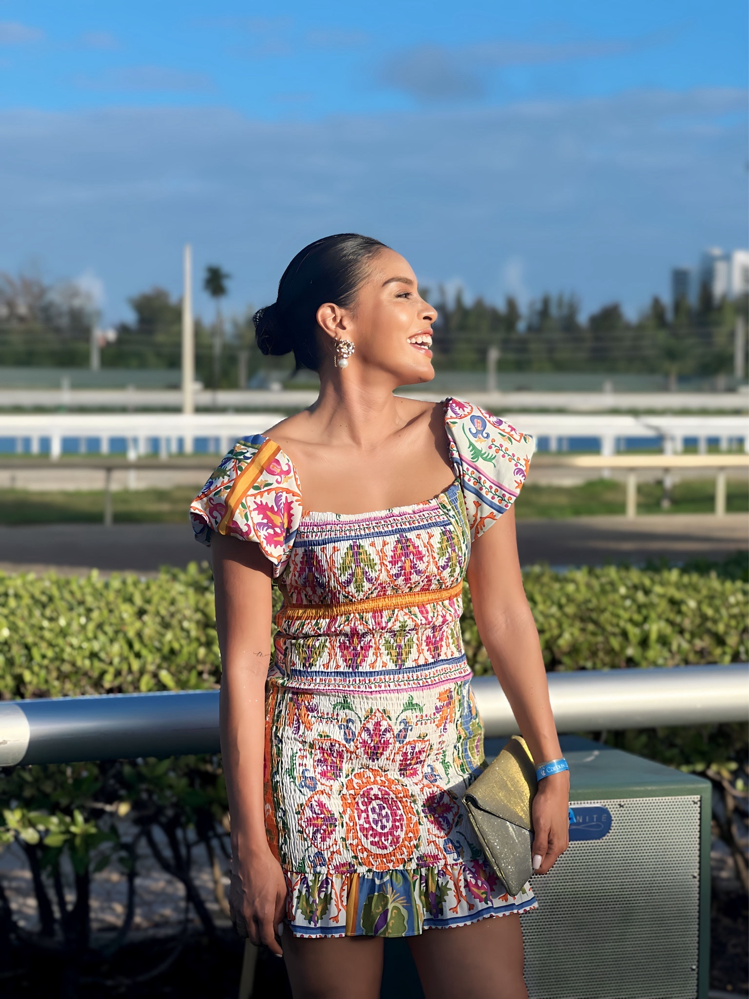 This weekend, I had a fabulous time at the Pegasus World Cup! I discovered this stunning, vibrant, and elegant dress at Mango on sale, and I absolutely adored it. The perfect sandals were a Nordstrom find, and my stylish bag was a Target gem from 2022!

Of course, I did my own makeup, and my beloved summer Fridays lipstick completed the look. To top it off, my eye-catching earrings are also from Mango. What do you think of my outfit? 🧡🧡✨

#LTKstyletip #LTKshoecrush #LTKMostLoved