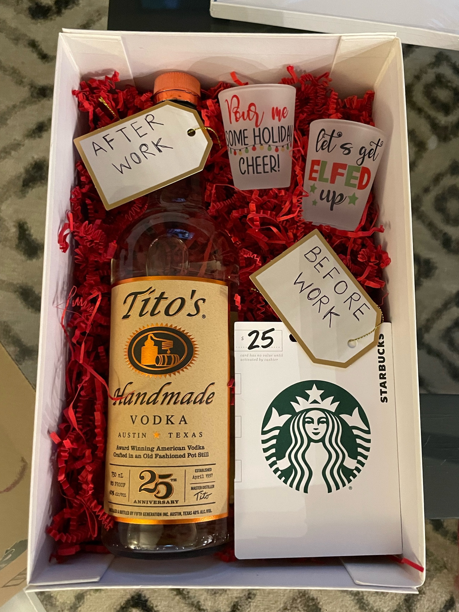 Great gift for co-workers or boss! Could easily adjust and use mini bottles and include a $5-10 gift card to make it more affordable. Wrapped with a bow and an ornament on the box! Super cute. 

#LTKSeasonal #LTKHoliday #LTKGiftGuide
