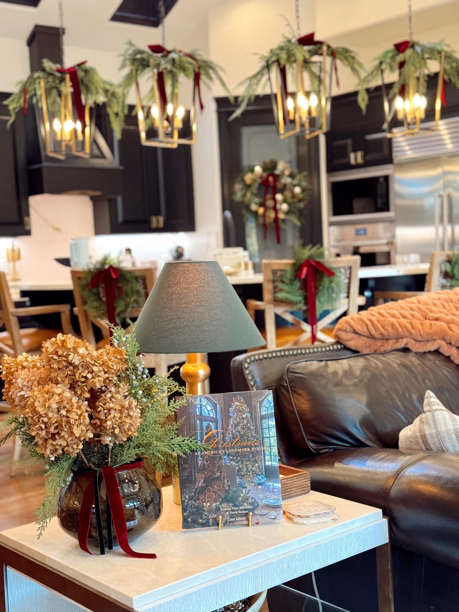 Turning pendant lights into holiday décor is absolutely part of the job description
Every year I find one more place to tuck a little garland... and honestly? No regrets.
For these, I just zip-tied a few picks together, criss-crossed them for fullness, and then zip-tied the whole bundle right onto the pendant. Easy + secure + so pretty.

#LTKHoliday #LTKHome