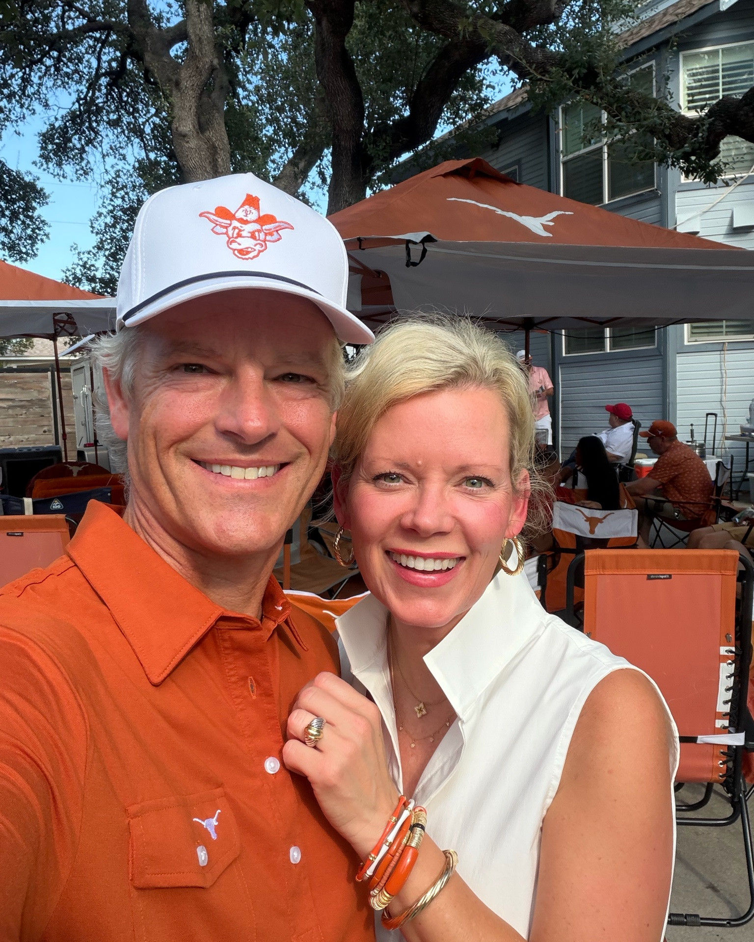 Wow!!!  What a game!!  It was hotter than you know what but worth it to see The Longhorns win.  I wore my new game day stack from @ALLIE+BESS with a white dress from @Tuckernuck. The darling paper plates from @Pavilion Paper were a big hit.