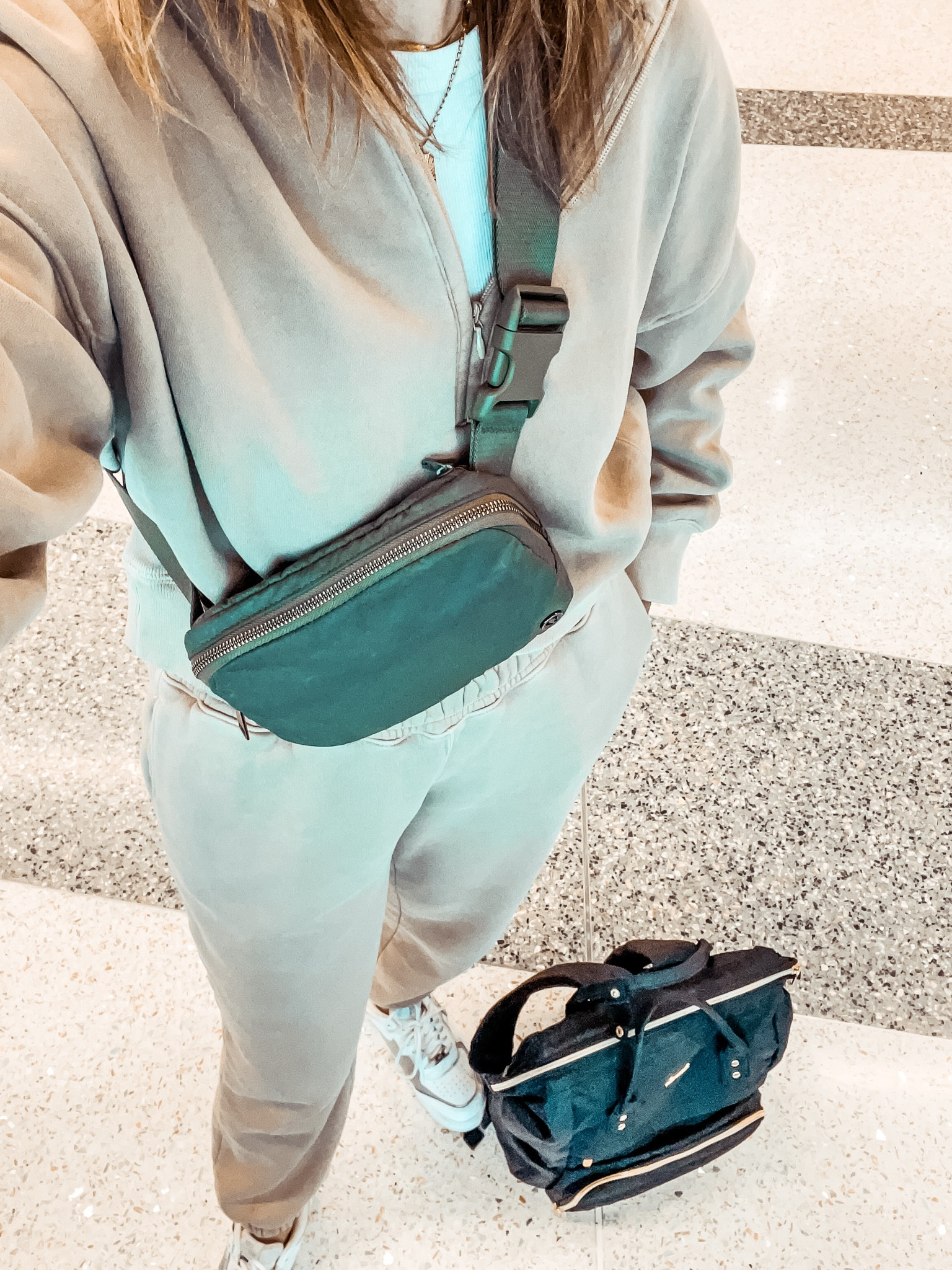 Back at the airport in the same travel outfit as last week. It’s just too good. And I’ve got my belt bag and computer bag, too. Another work trip starts now. 

#LTKover40 #LTKtravel #LTKshoecrush