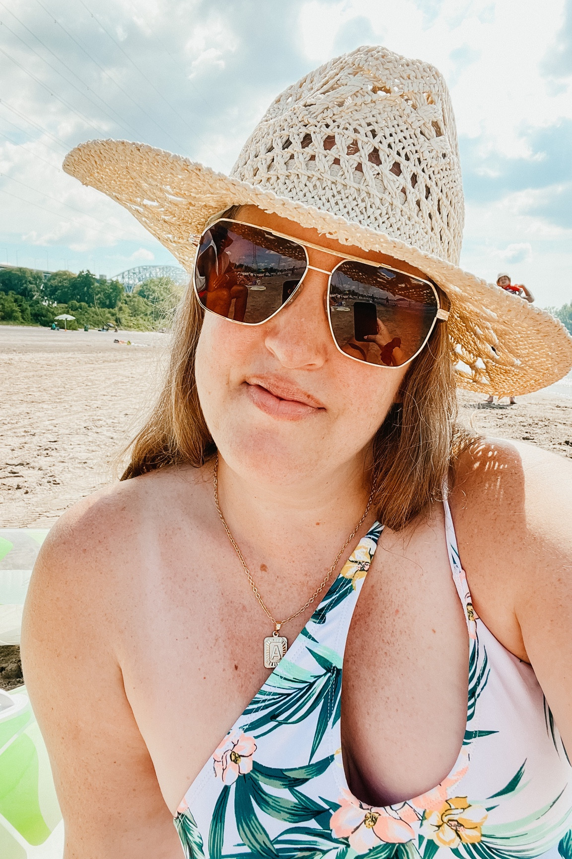 Beach day!  Amazon sunglasses & necklace 

#LTKunder50 #LTKswim #LTKSeasonal