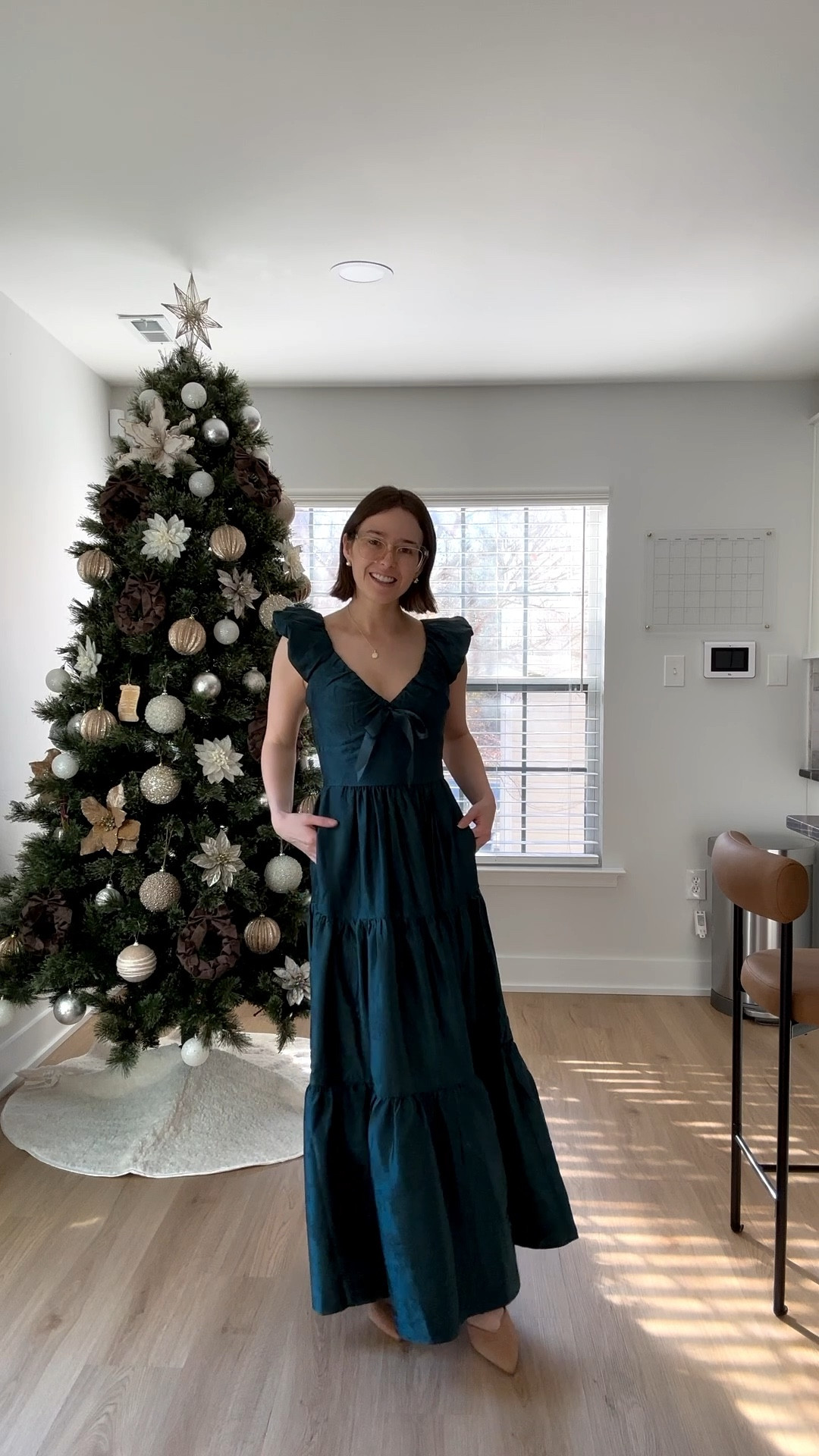 Francesca’s Flutter Sleeve Tiered Maxi Dress in forest green😍 this would be perfect for Christmas family photos or events! I’m 5’3” and wearing an xs and it’s tts - it has pockets!! I could wear flats and it won’t drag the ground. ‼️50% off right now making it under $50!‼️ 

Christmas card dress, Christmas photo dress, Christmas dress, family photos dress, maxi dress, petite friendly dresses, dress with pockets, cocktail dress, winter wedding guest dress, fall wedding guest dress, holiday party dress, holiday event dress, Christmas party dress

#LTKPetite #LTKCyberWeek #LTKHoliday