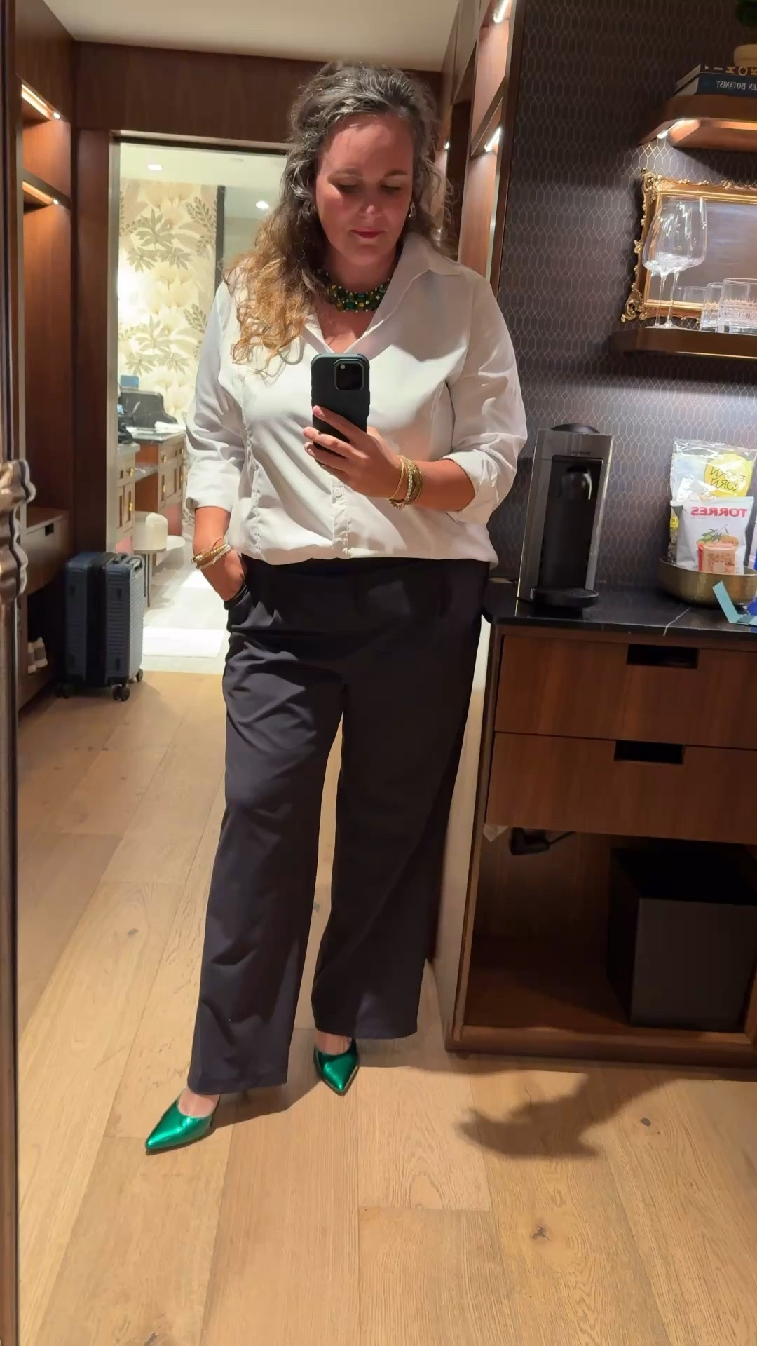 These shoes are EVERYTHING. They can make an outfit instantly elevated and I adore them. I paired the shoes with these work pants that can pull double duty as dress pants, a white shirt, and a bold vintage necklace. It packed easily in my carry on and made a classy date night dinner outfit. 

#LTKMidsize #LTKOver40
