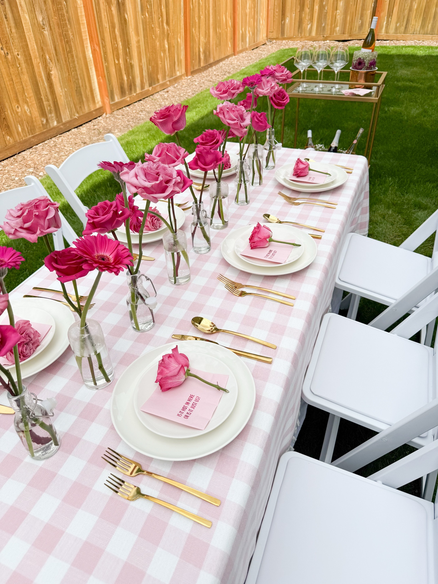 Mother's Day brunch backyard set up! 

Tablecloth, ice mold bucket, bar cart, bar cart, table, bud vases, chairs, wine glasses #LTKParties 

#LTKMothersDay #LTKSeasonal #LTKHome