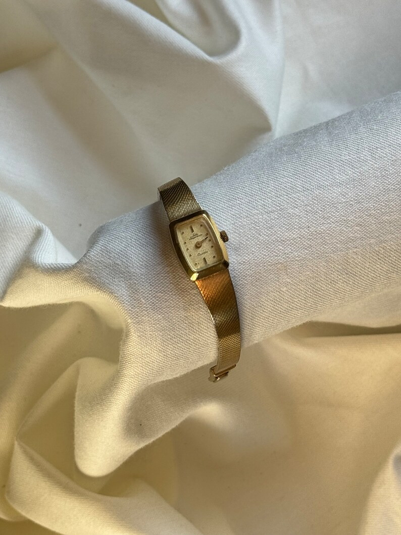 Vintage Jules Jurgenson gold tone small dainty watch | Etsy (US)