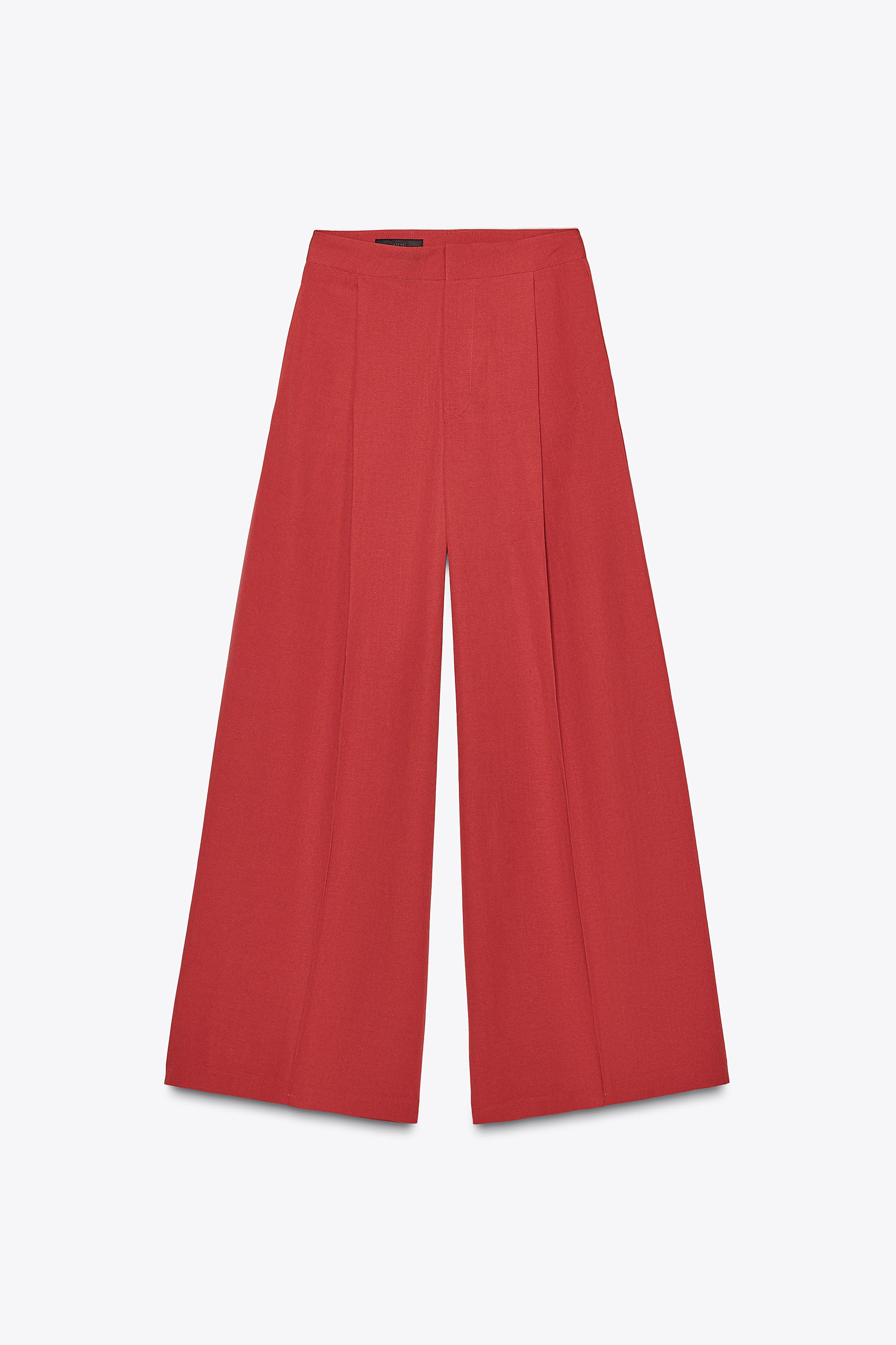 High-waisted pants with belt loops. Double pleat detail. Side pockets and back false welt pockets... | Zara US
