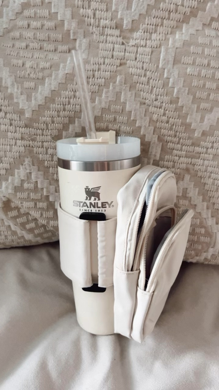You don't have to be into Stanley tumblers, I have a variety of different versions, and this carrier bag fits them all. I personally find this attachable carrier very useful, because I don't always want to carry a purse or bag around. This is great for on the go, fits my phone, keys, card, and additional items. It actually holds more than I expected, but so handy.

#stanley #tumbler #stanleyaccessories #tumbleraccessories #wrinklefreestraw #straw #carrierbag #attachablebag ##slingbag #amazonfind #amazonmusthave #amazonfashionfind 


#LTKHome #LTKSummerSales #LTKSaleAlert
