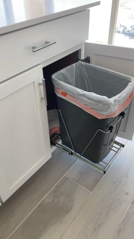 DIY Cabinet pull out trash can. This was so easy to install. It comes with the trash can, you can choose the color you want to match your kitchen 

#LTKFind #LTKunder100 #LTKhome