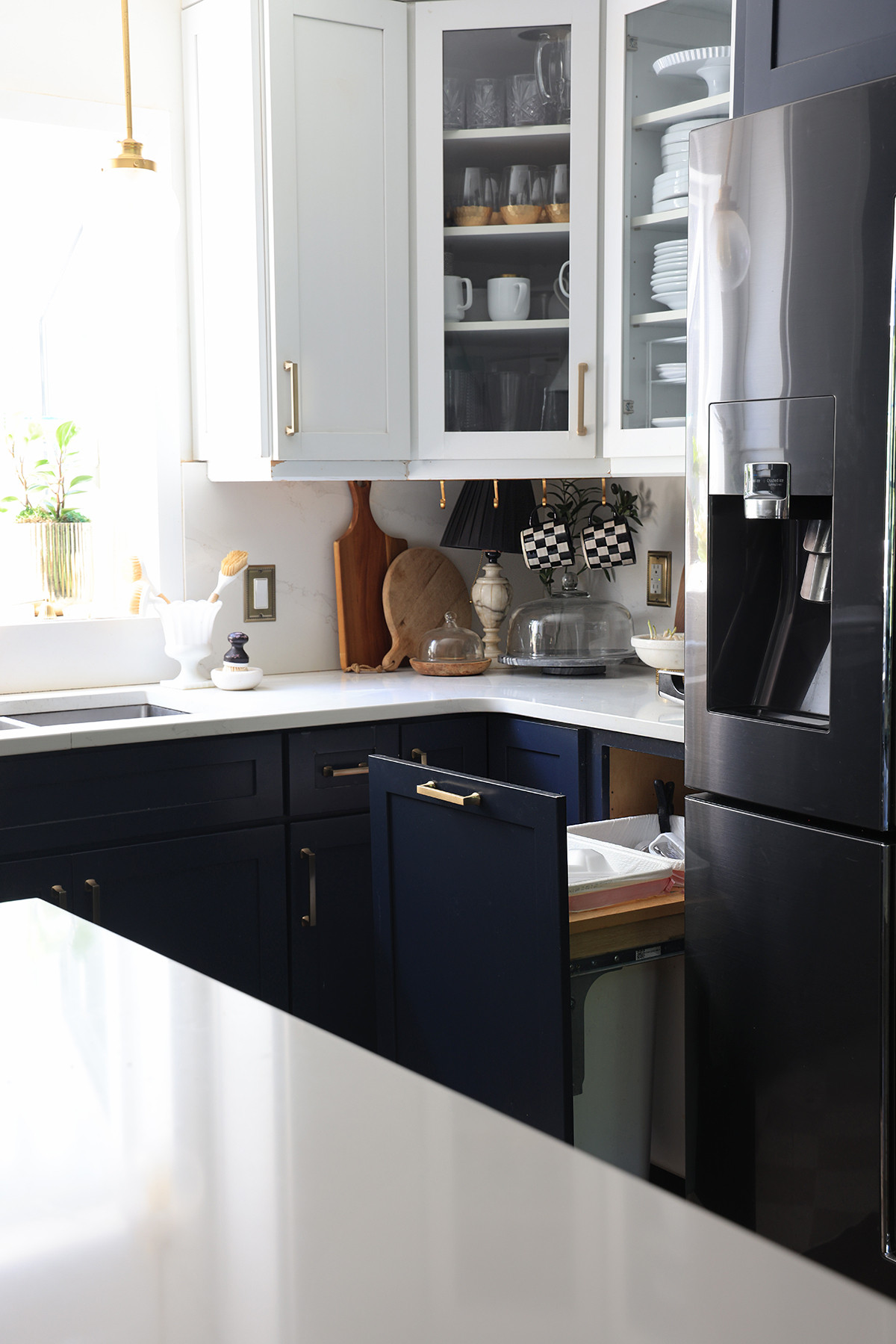 Hide the trash can and recycling bin with a top-mount trash pullout attachment for kitchen cabinets | Double mount or single mount, add it to your existing kitchen cabinets 

 #LTKHome