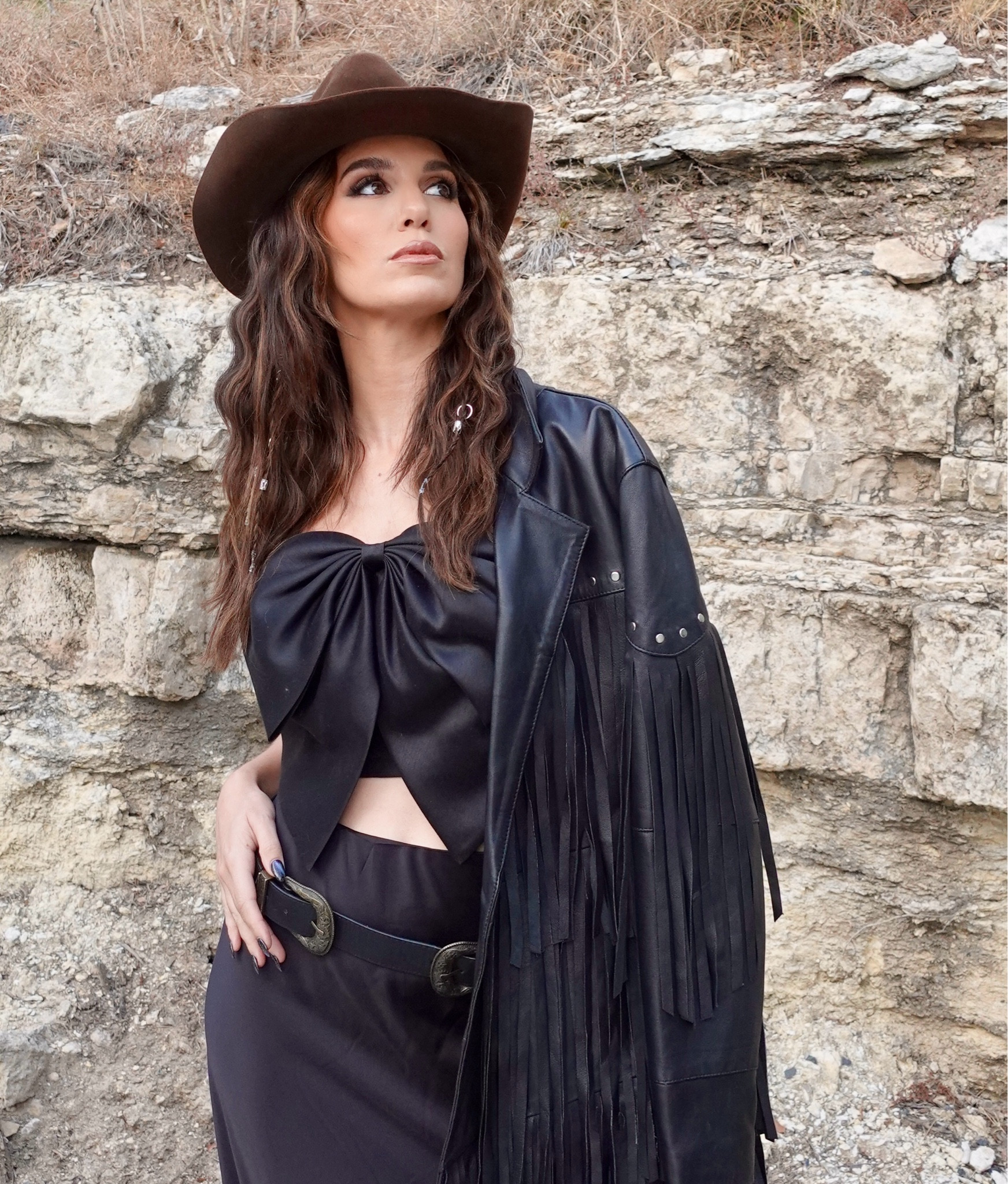 Here's a closer look at the 'fit I wore for the Clarins Double Serum event over the week: bow top paired with a silk skirt, black knee-high boots, and some vintage-looking double-buckle belt to elevate the look! Added a finishing touch with a corduroy cowboy hat and a fringed jacket that I OH SO LOVE!
#partyinspo #cowboylook #fashionstyling #allblackoutfit

#LTKSeasonal #LTKStyleTip #LTKParties