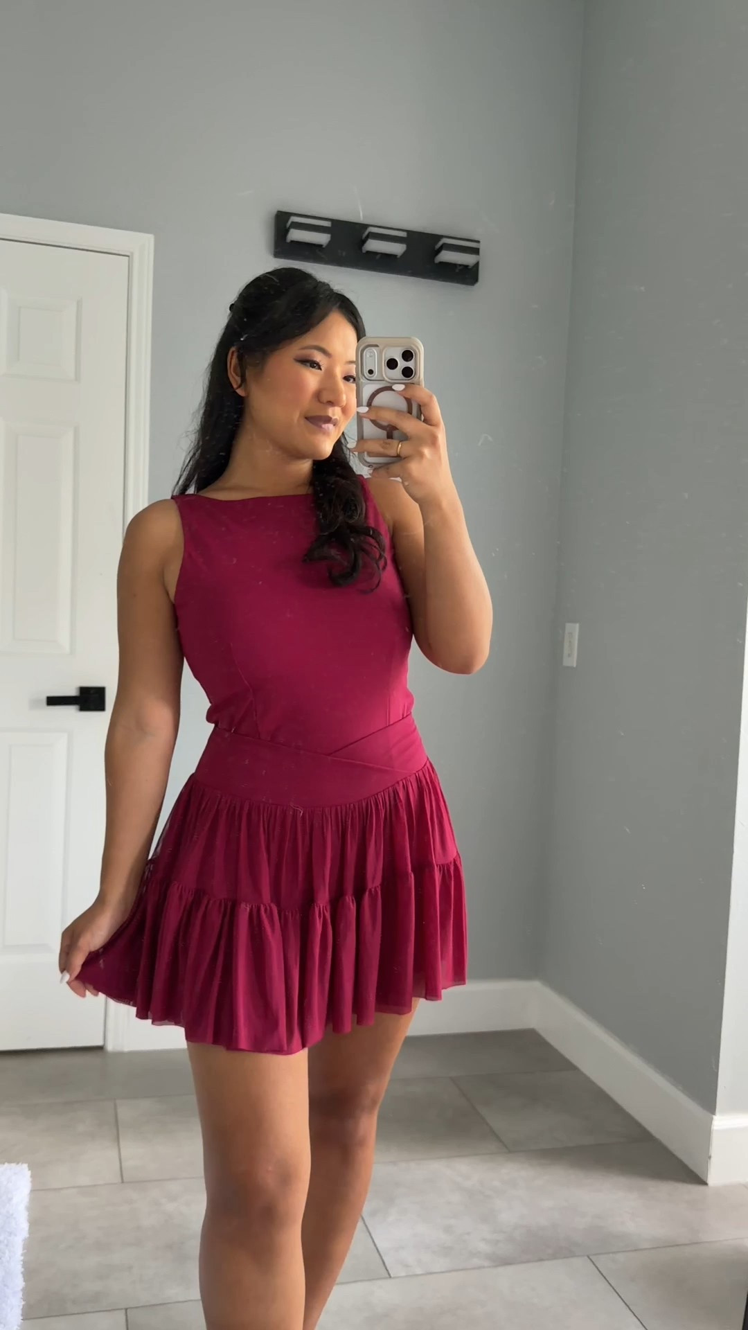 Blogilates Women's Ballerina Skort wearing size medium. Blogilates Women's Boatneck Crisscross Tank Top wearing size large. Blogilates Women's Marshmallow Full Zip Hooded Sweatshirt wearing size medium. 