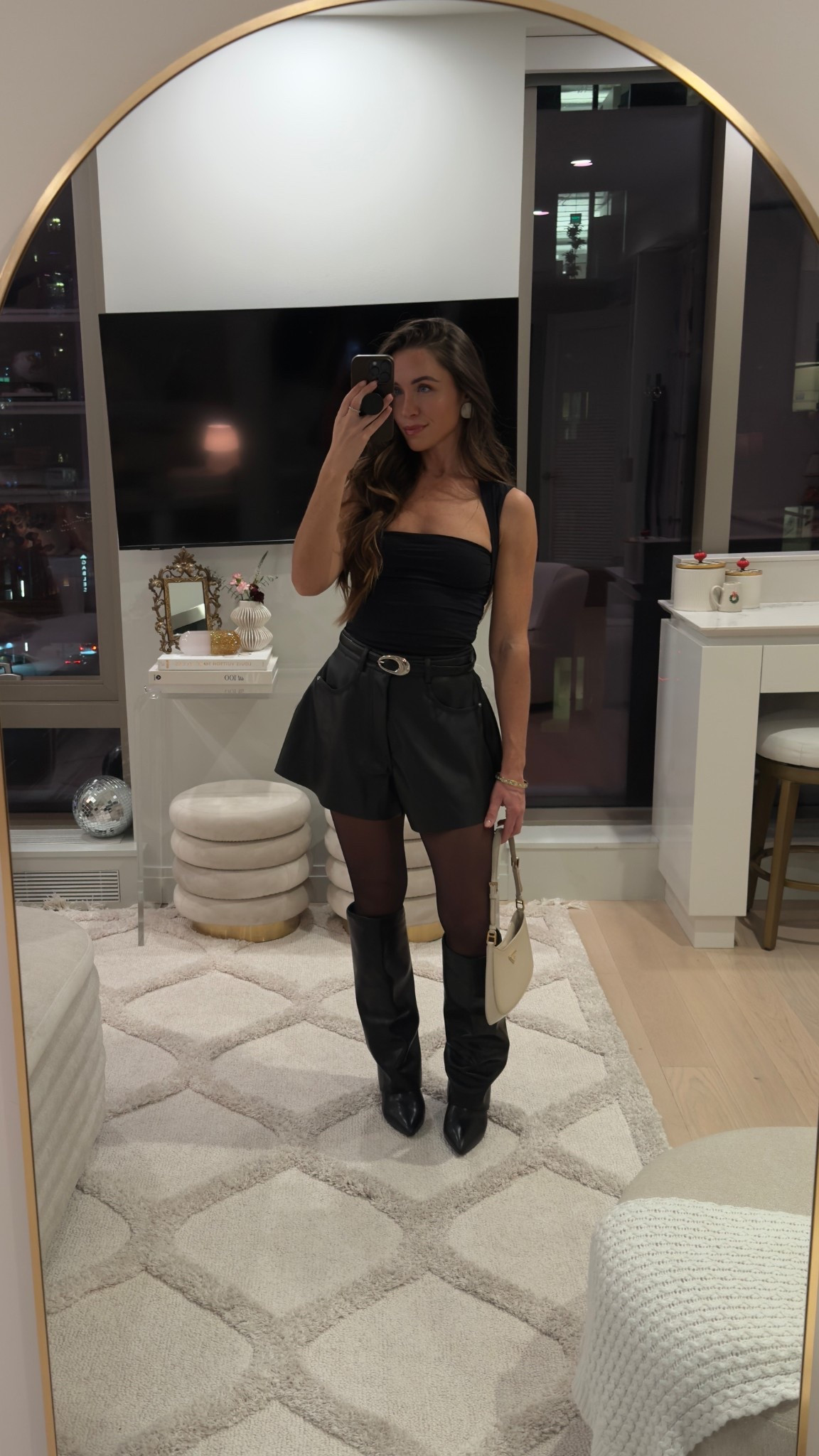 night out outfit 
love these black leather shorts paired with the best black sheer tights (wolford)