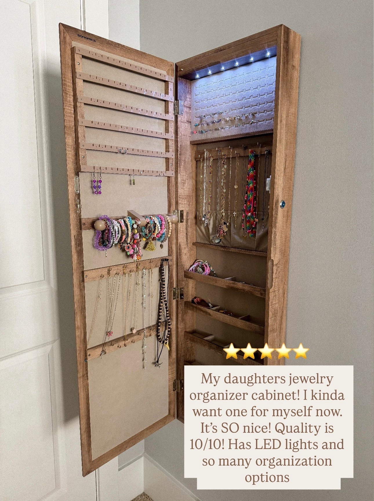 Amazon jewelry cabinet I can’t stop recommending 🤍 This wall-mounted jewelry organizer is the prettiest way to keep necklaces, bracelets, earrings, and accessories perfectly organized. It has built-in LED lights, tons of storage hooks, shelves, and ring slots — plus it keeps everything tangle-free and easy to find.

We got this for my daughter and now I’m officially ordering one for myself because the quality is 10/10 and the design looks like a chic piece of furniture, not just storage. Perfect for bedrooms, closets, dorm rooms, or gift ideas for girls and teens who love accessories.

If you’ve been searching for the best jewelry organizer cabinet, this Amazon find is seriously a game-changer ✨

#amazonfinds #amazonhome #amazonmusthaves #jewelryorganizer #jewelrycabinet #jewelryarmoire #jewelrystorage #closetorganization #bedroomorganization #homestorageideas #organizationgoals #teenroomdecor #girlsroomdecor #giftideasforgirls #giftideasforteens #wallmounteddecor #ledlighting #homeorganization #organizedhome #ltkhome