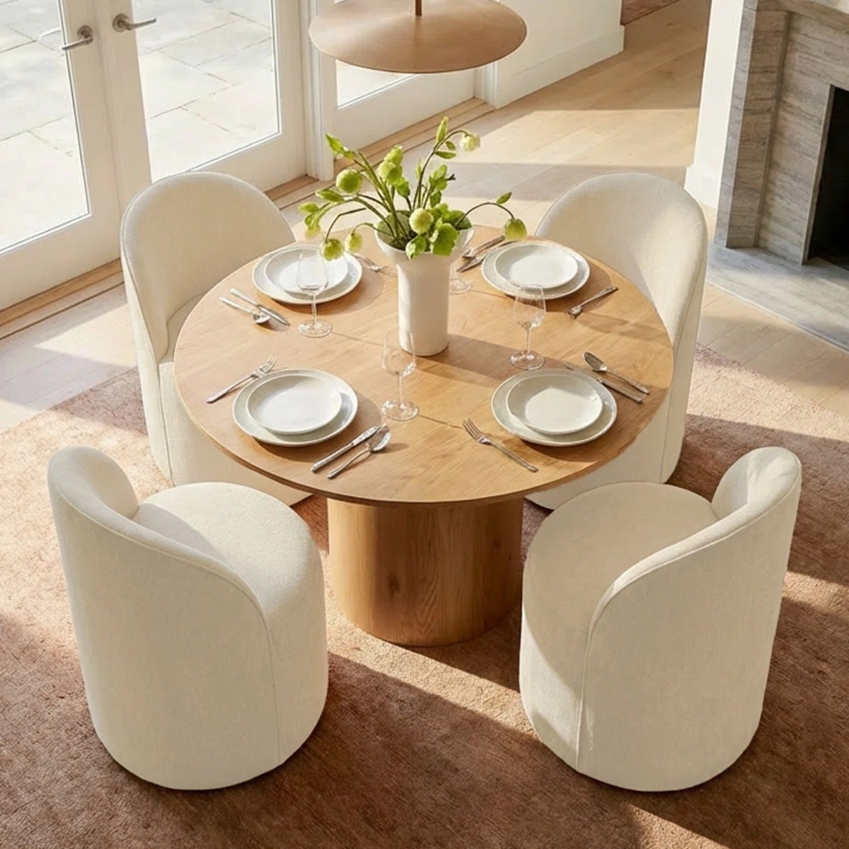 Designed with comfortable upholstered fabric chairs and a refined round table, this dining set blends everyday functionality with an effortlessly sophisticated aesthetic. ON SALE and under $1,100. The dining table is available in both light tan and black finishes, while the plush upholstered chairs come in multiple color options.

Keywords:

* round dining table set
* upholstered dining chairs
* 4 person dining set
* modern dining furniture
* kitchen dining set
* breakfast nook furniture
* contemporary dining set
* dining room furniture
* organic modern decor
* warm neutral interiors
* designer inspired dining room
* cozy dining space
* curated home aesthetic
* modern farmhouse dining
* boutique café aesthetic
* elevated everyday living

#LTKHome #LTKSaleAlert #LTKSeasonal