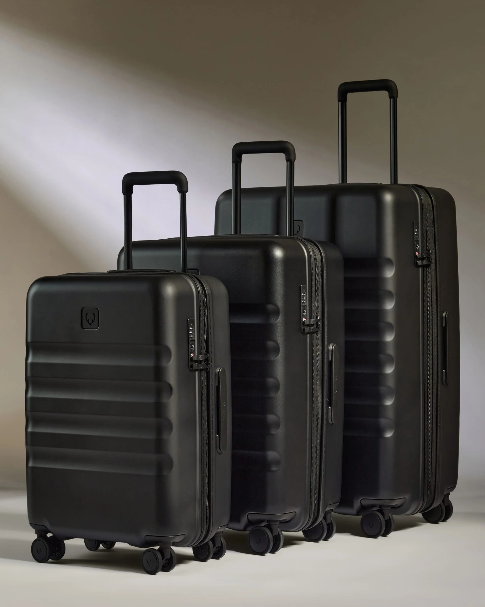 Large Cabin Suitcase Set in Black - Icon Stripe | Lightweight & Hard Shell Suitcase | Antler UK