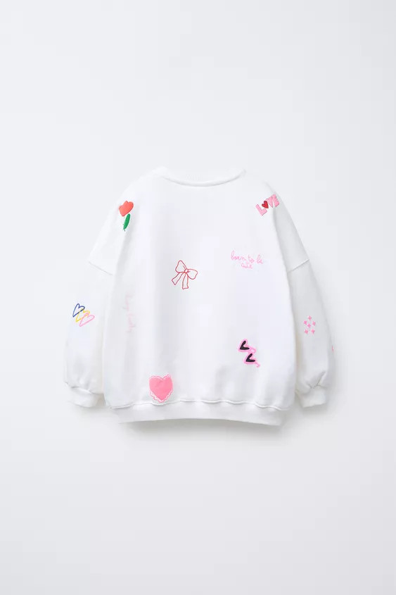 Sweatshirt with a round neck and long sleeves. Ribbed trims. Featuring a raised patch print. | Zara UK