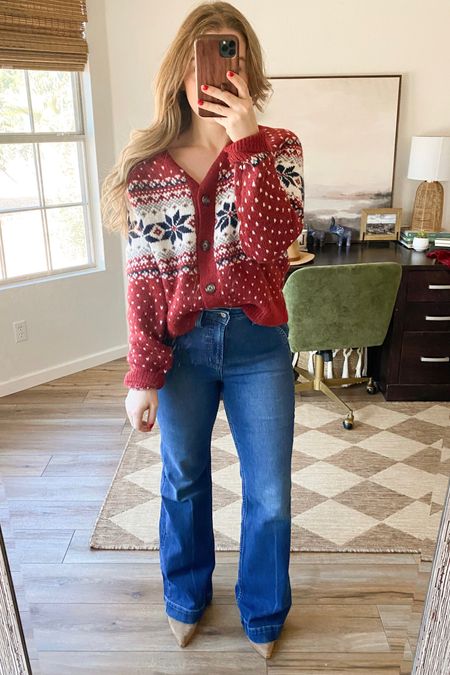 Christmas outfit. Winter outfits. Flare jeans.

Wearing medium in cardigan for oversized fit (usually a small)

Jeans run big! I should have sized down 1-2 sizes. 

#LTKGiftGuide #LTKSeasonal #LTKHoliday