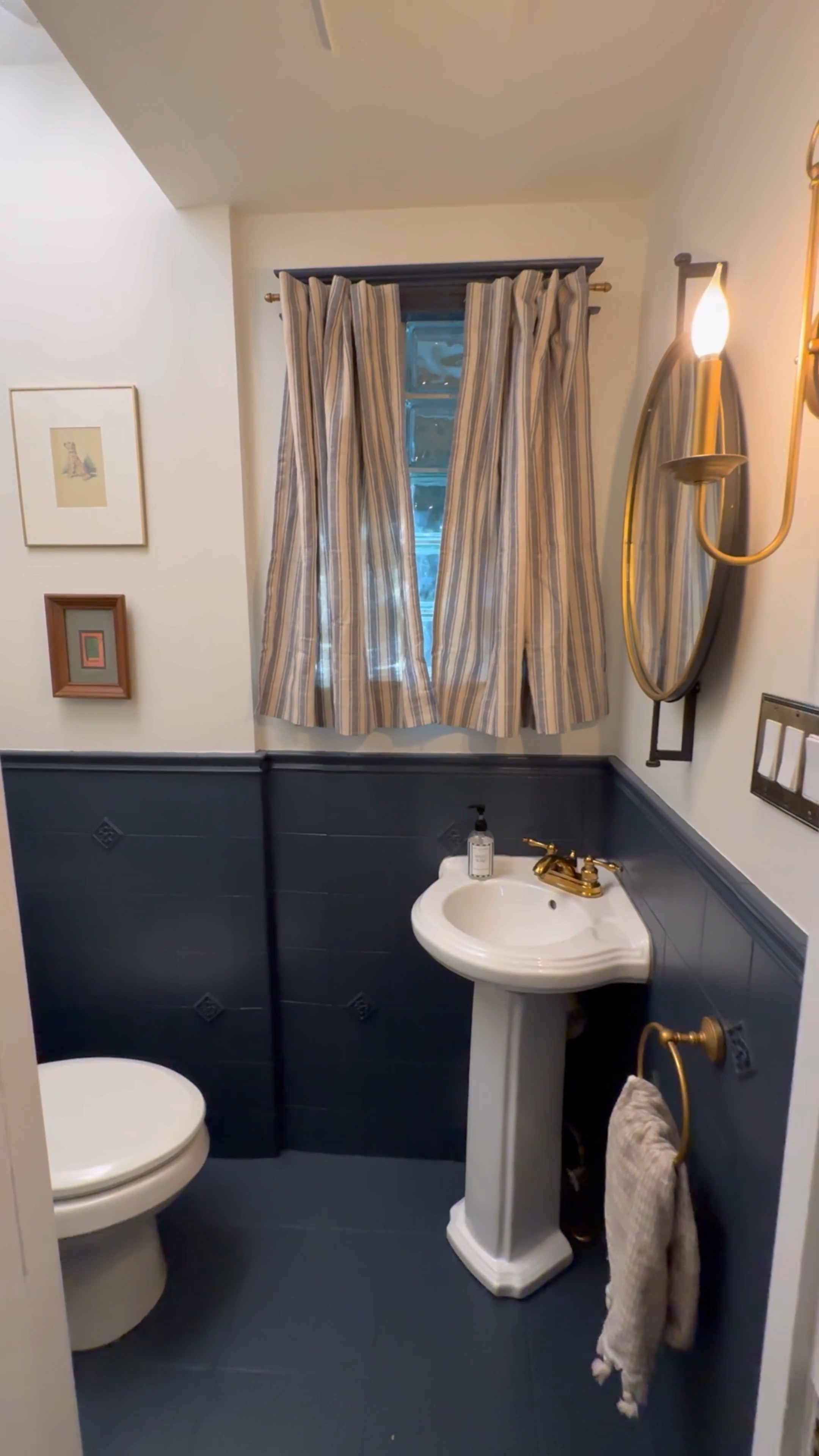 A couple of days and a couple of dollars gave us a rapidly refreshed powder room that feels just right ✨ On the blog, I’m sharing all of the details, why we went for a budgeted refresh and all of the items to shop! Read via the link in bio or by searching Powder Room Rapid Refresh on the blog.
•
•
•
Powder room, painted tile, curtains, cafe curtains, small bathroom, brass fixtures, oval mirror, wood frame, brass frame, towel holder, amazon finds, candle sconce, wall light, bathroom refresh, home before and after, renovation, moody bathroom 

#LTKunder50 #LTKhome #LTKsalealert