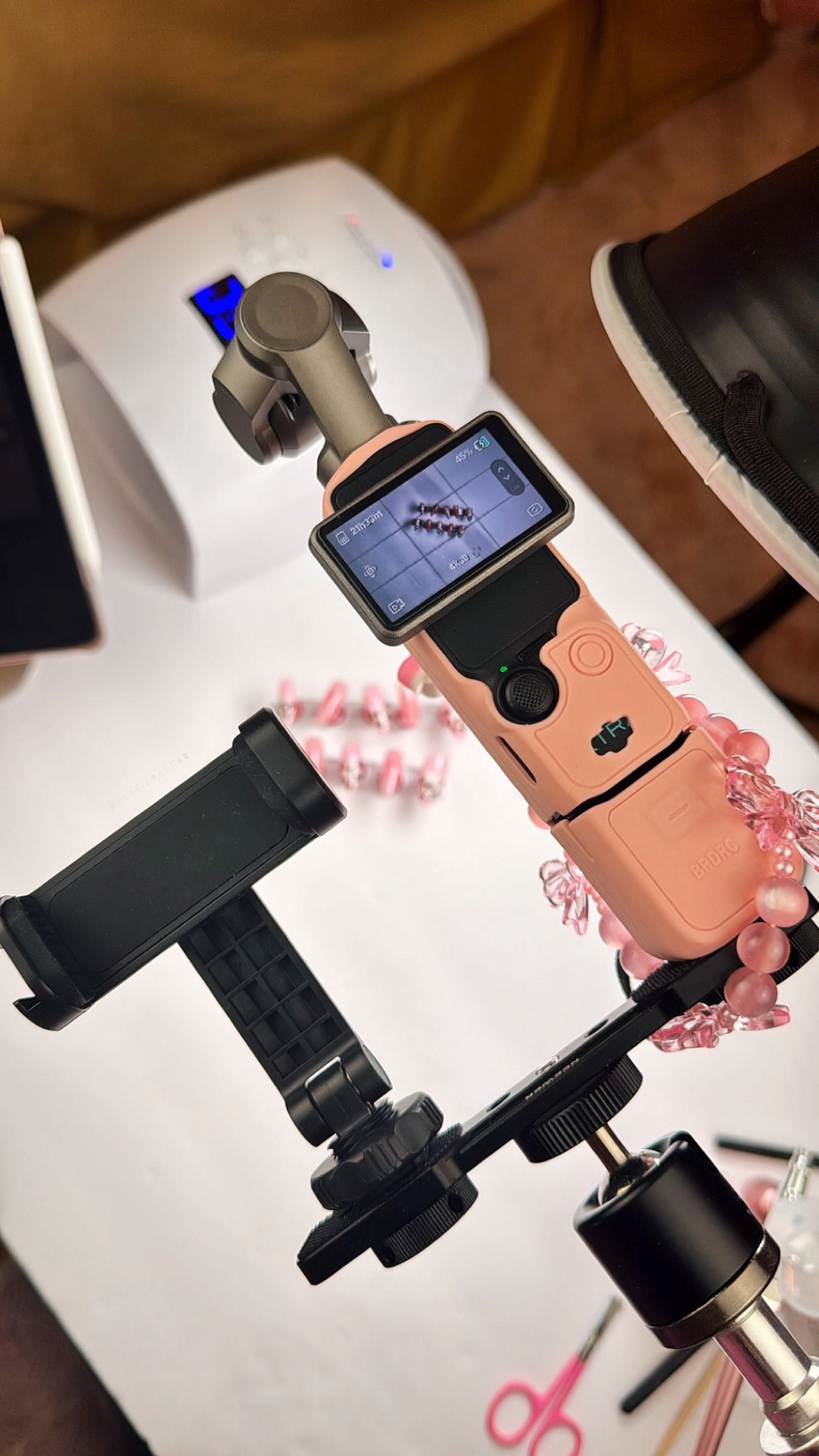 If you're a creator trying to figure out how to film on your phone and your camera at the same time to make sure you get all the angles, I got you 🎥✨ 

Using this phone mount by Neewer allows me to mount my iPhone and my Xtra Muse Vlog Camera, so I can record with both at the same time. 

This is great for when I'm vlogging, etc. and need to film both horizontal and vertical video at the same time on both.

Here I'm filming a nail tutorial, so I have everything mounted on my desk so I can film on the tabletop. 

 #LTKdayinmylife #LTKvlog