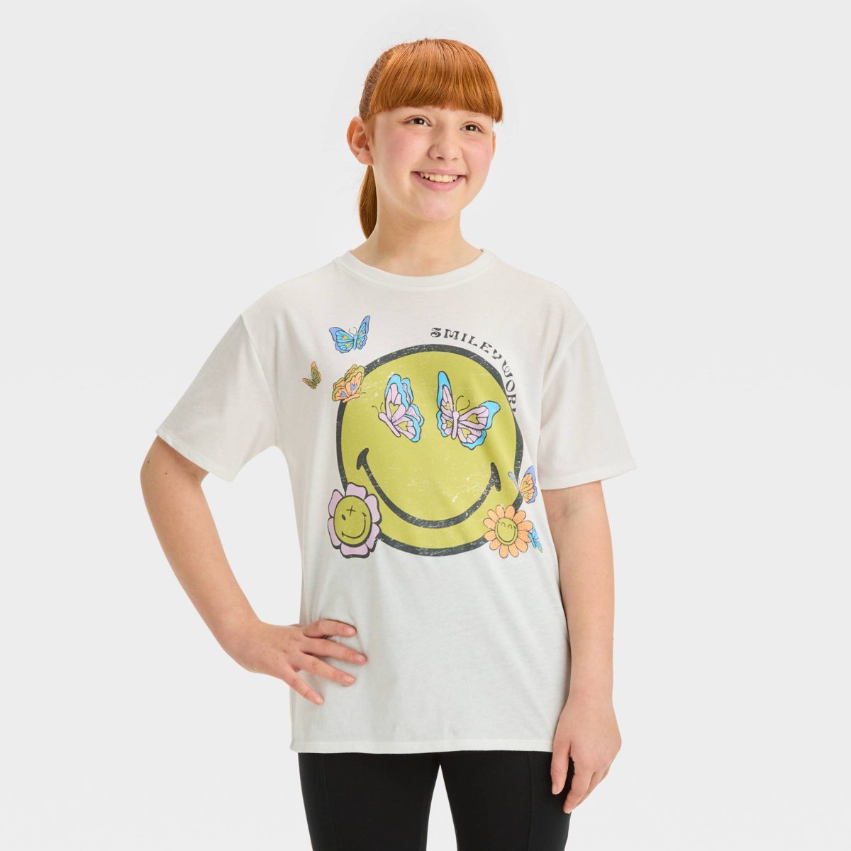 Girls' Short Sleeve Oversized Butterfly Smiley World Graphic T-Shirt - art class™ White | Target