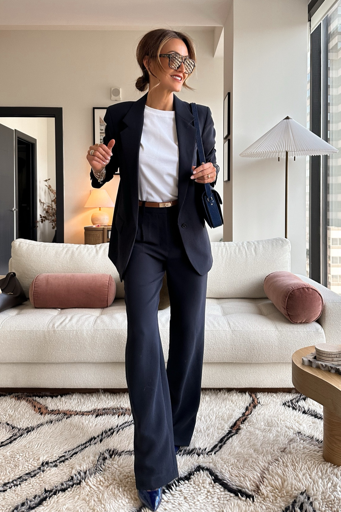 The chicest navy suit I’ve ever put on! Trousers are crepette and perfect for transitioning into spring. Size 4, work well for the office or a weekend or even travels! I love the relaxed blazer (size small) to be worn over jeans for a chic weekend outfit. Tee is the perfect fit small
This is a great office / work outfit! Amazon belt is my favorite! 

#LTKStyleTip #LTKFindsUnder50 #LTKWorkwear