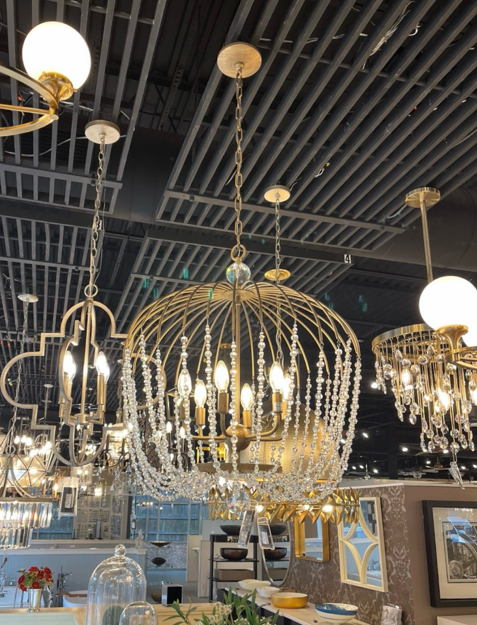 The prettiest chandelier for over my master bathtub! I just found it on Amazon for $400 less than the specialty lighting store my builder ordered from.





Varaluz Voliere 6 Light Crystal Tall Pendant - Havana Gold
Birdcage chandelier
Bathroom lighting 

#LTKhome #LTKstyletip