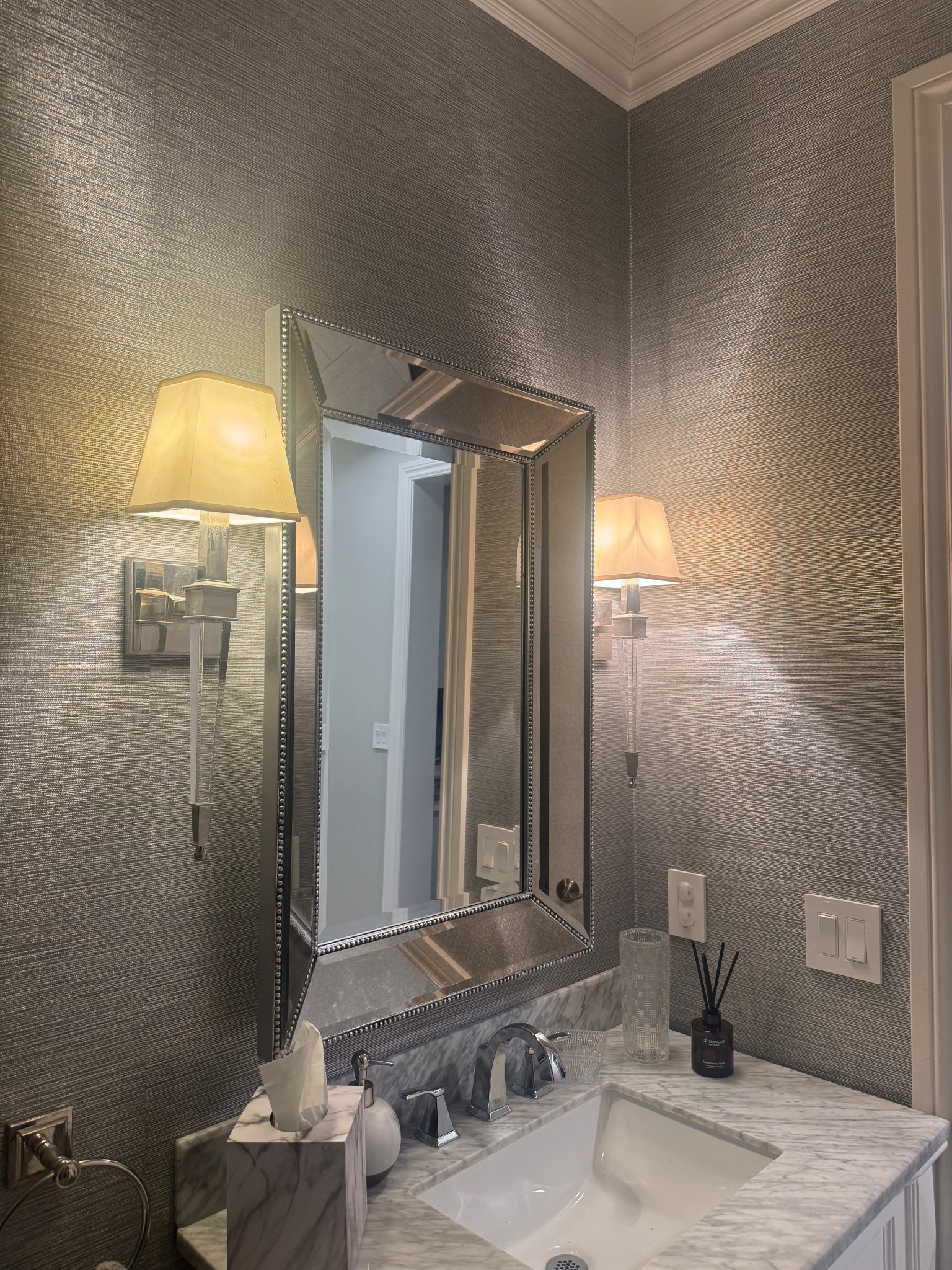 Bathroom refresh! These sconces and mirror upgraded the look of our bathroom by giving it a hotel feel.

#LTKHome