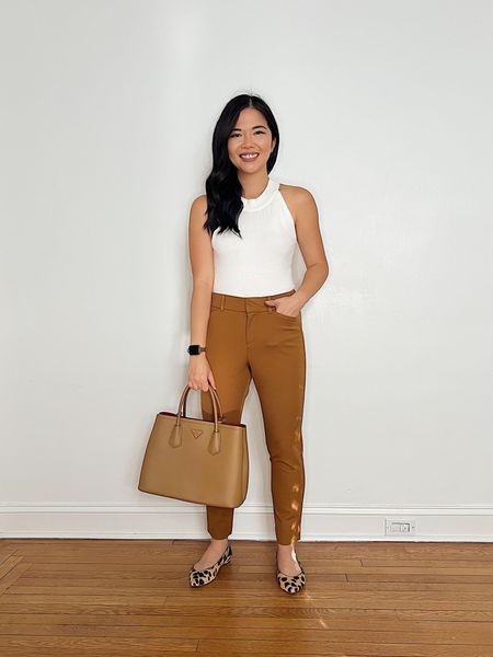 Fall casual outfit, Amazon fashion, Old Navy, transitional outfit, teacher outfit idea, business casual work outfit: white sleeveless sweater (XS), brown high waisted pants (4P), brown Apple Watch strap, similar tan bag, similar leopard flats.

#LTKunder50 #LTKSeasonal #LTKworkwear