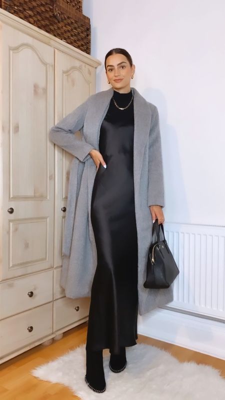 Slip dress styling • grey coat, black high neck top, slip maxi dress, black handbag, black sock boots

#LTKstyletip